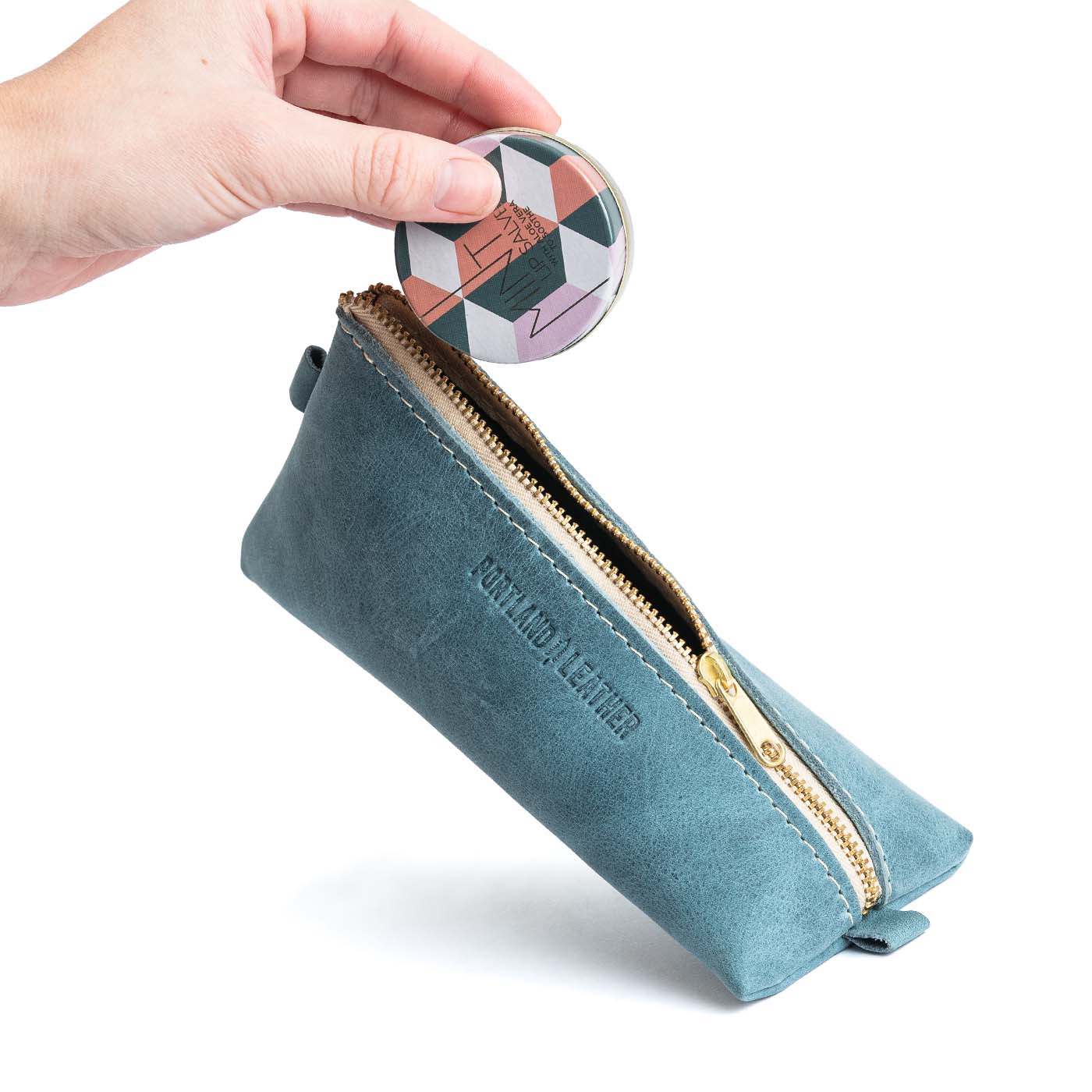 All Color: Aqua | Small leather triangular zip pouch