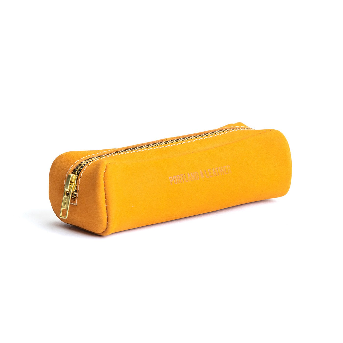 All Color: Turmeric | Leather pouch with a curved top and zipper