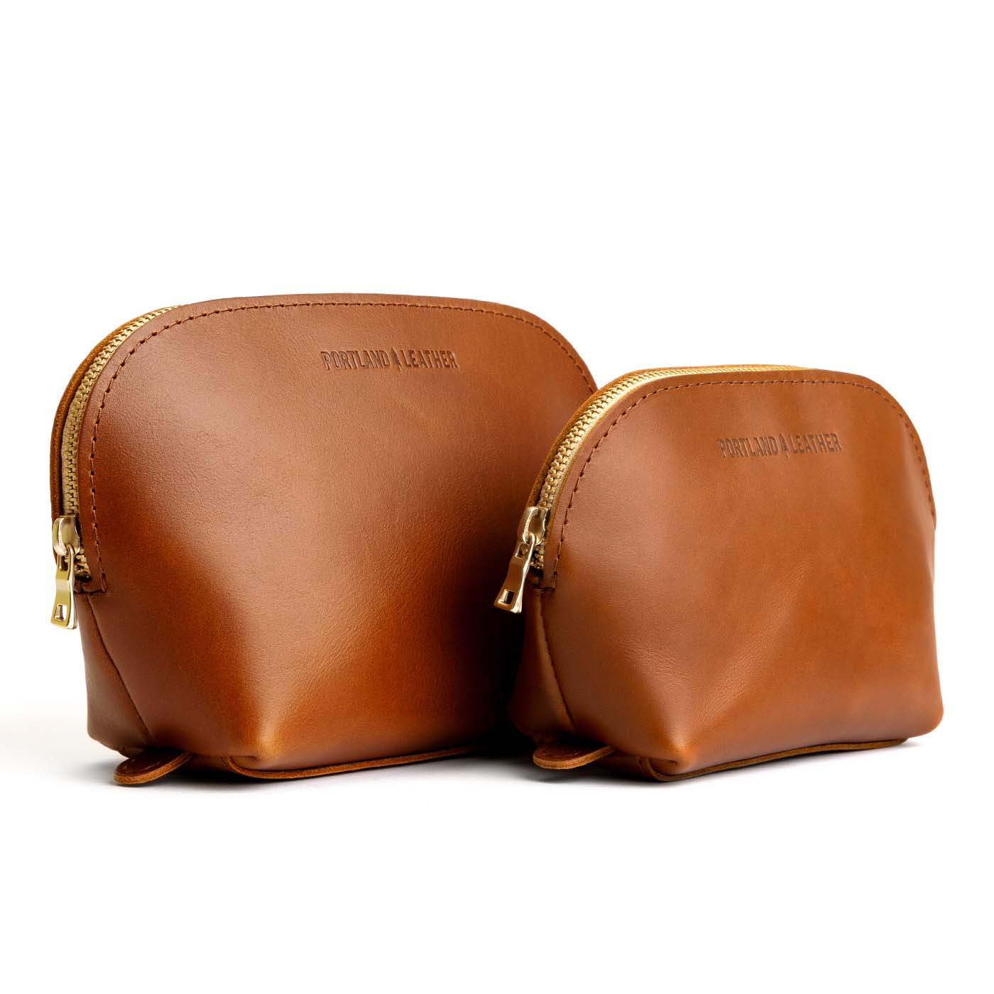 Honey | Leather makeup bag with curved top zipper and flat bottom