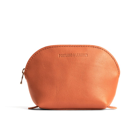 Persimmon*Belladonna | Leather makeup bag with curved top zipper and flat bottom