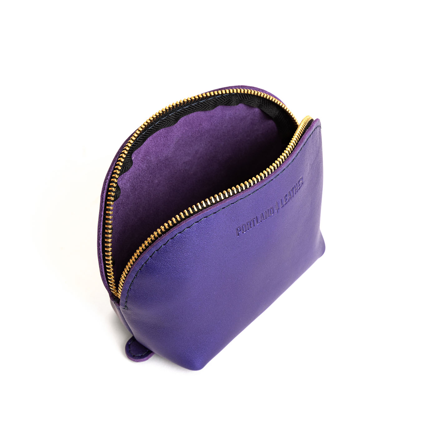 Amethyst*Bella | Leather makeup bag with curved top zipper and flat bottom