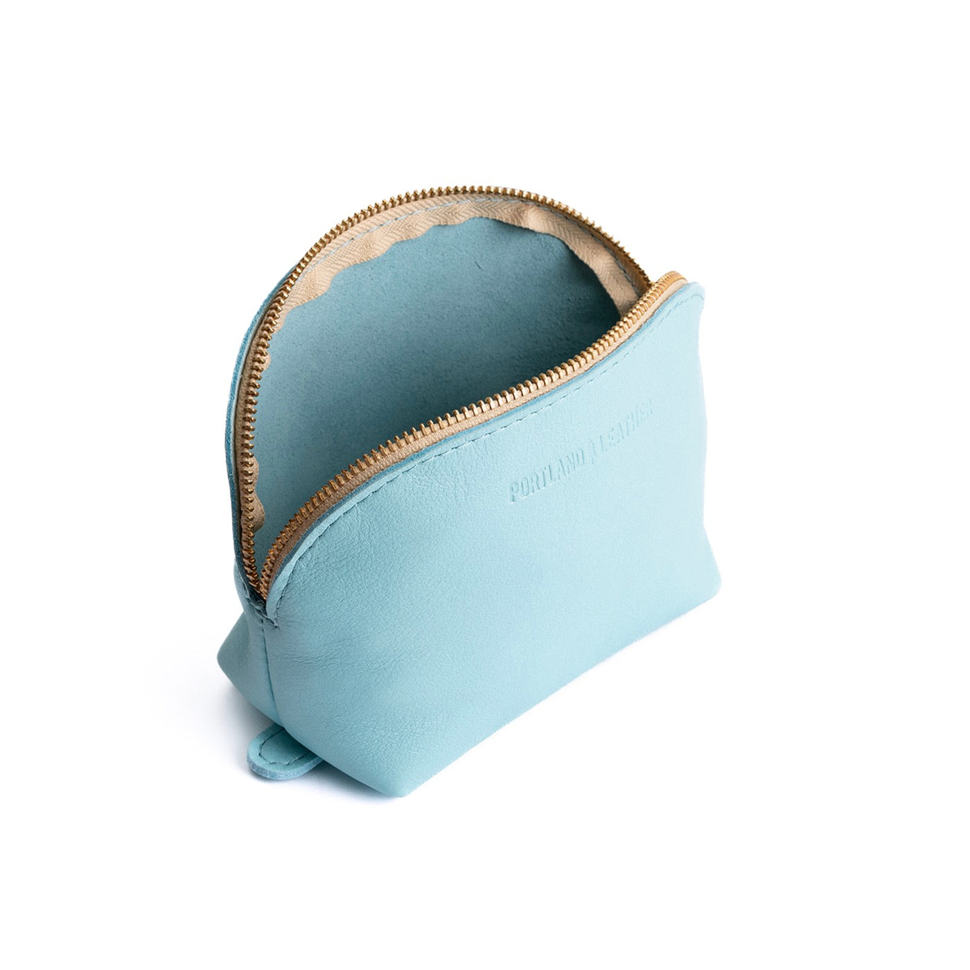 Cabo Bella | Leather makeup bag with curved top zipper and flat bottom