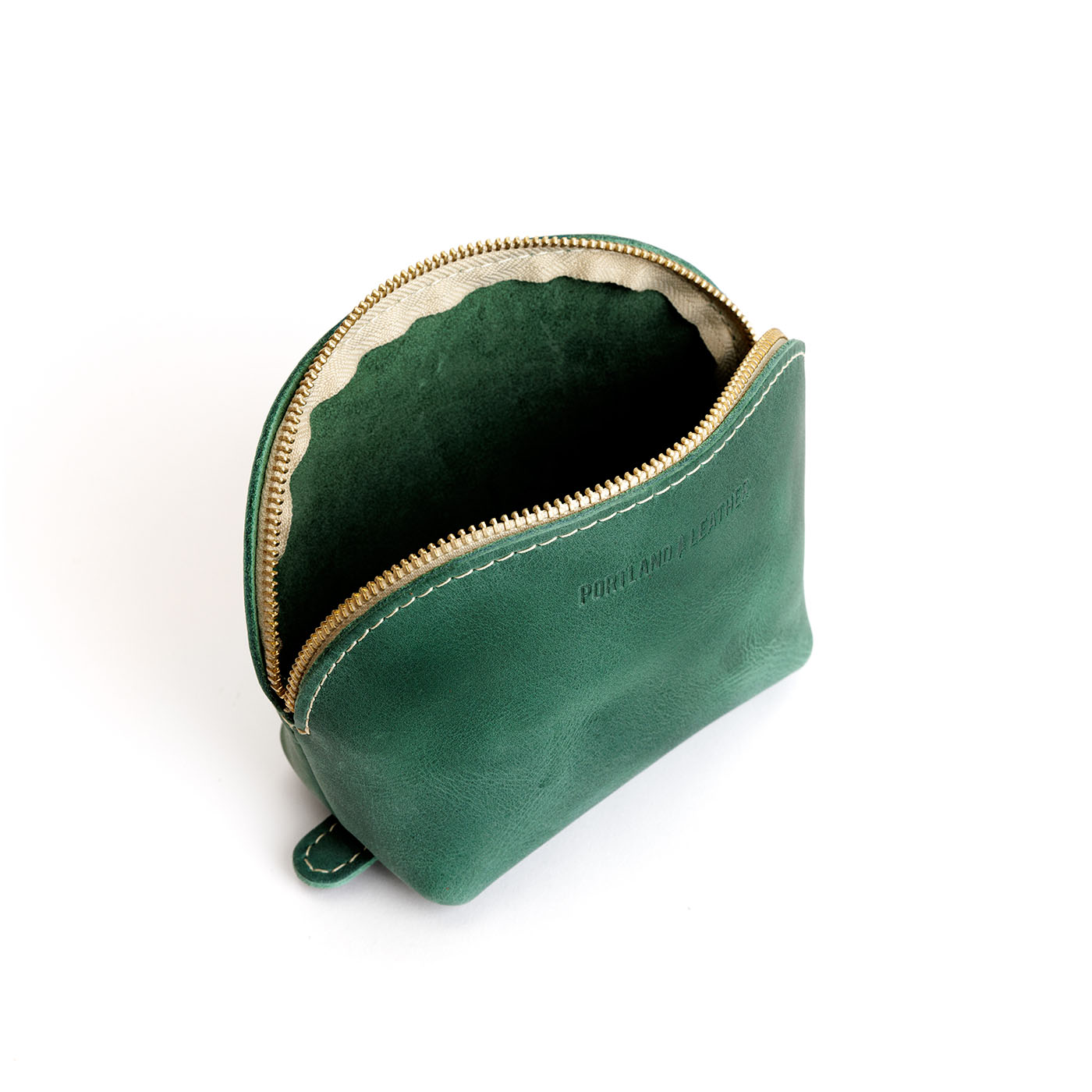 Surf*Bella | Leather makeup bag with curved top zipper and flat bottom