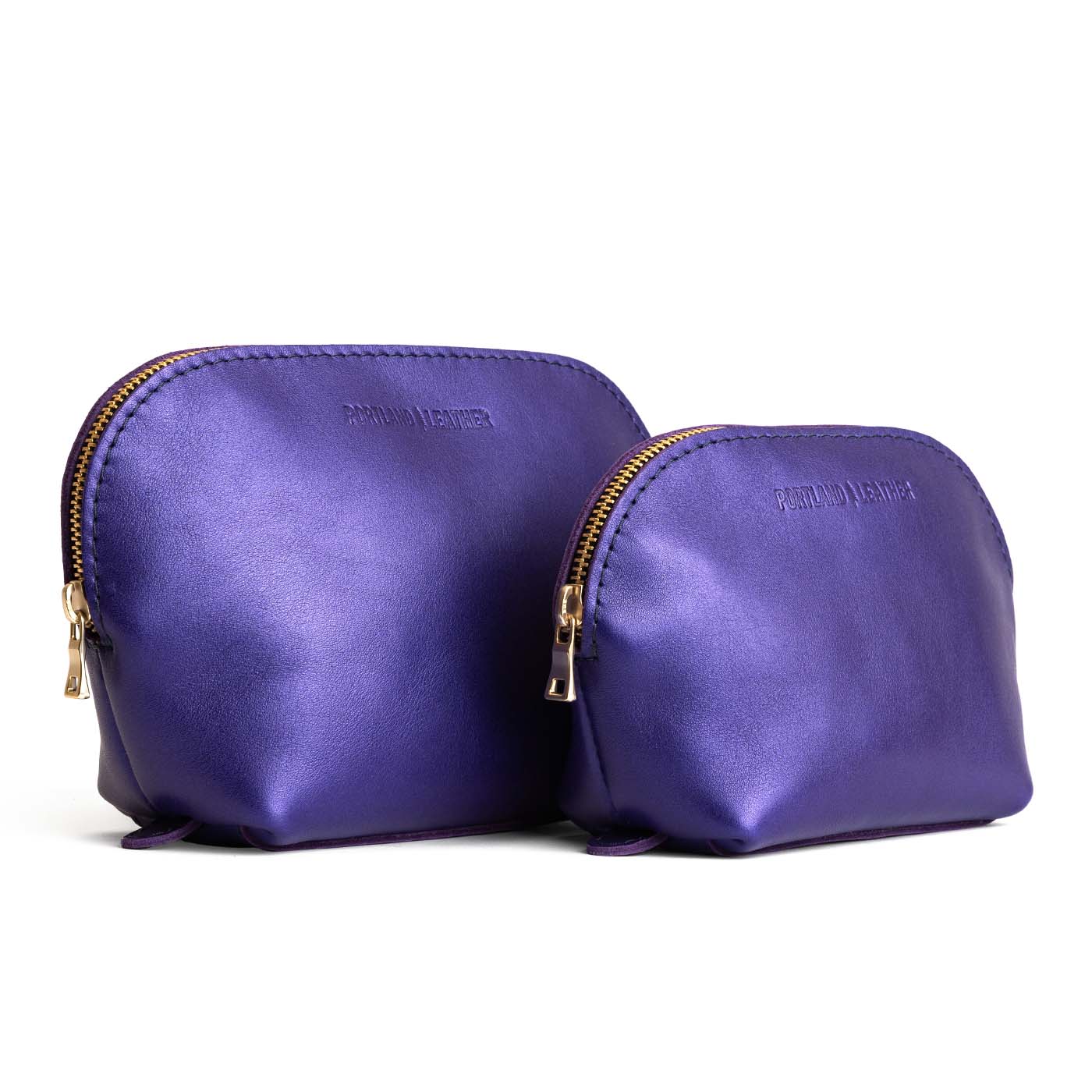 Amethyst | Leather makeup bag with curved top zipper and flat bottom