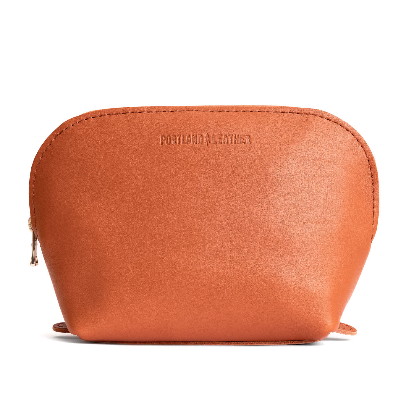 Persimmon Belladonna | Leather makeup bag with curved top zipper and flat bottom