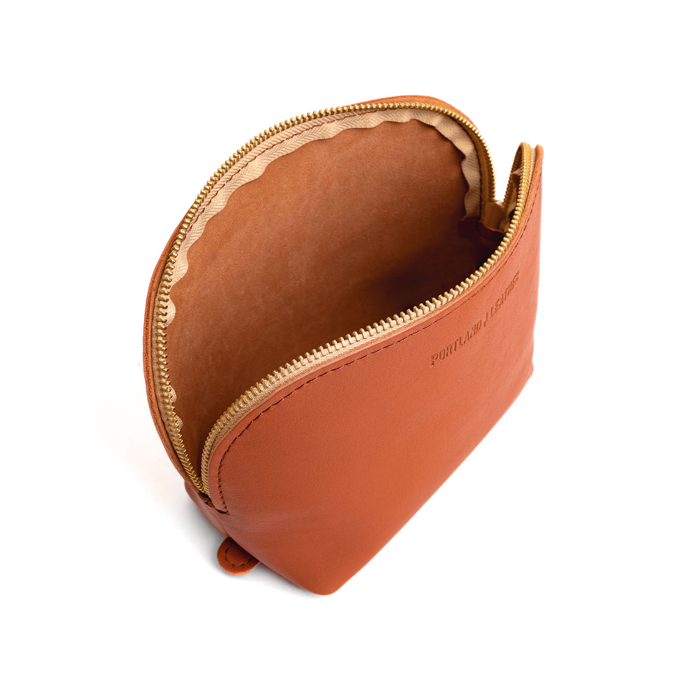 Persimmon Belladonna | Leather makeup bag with curved top zipper and flat bottom