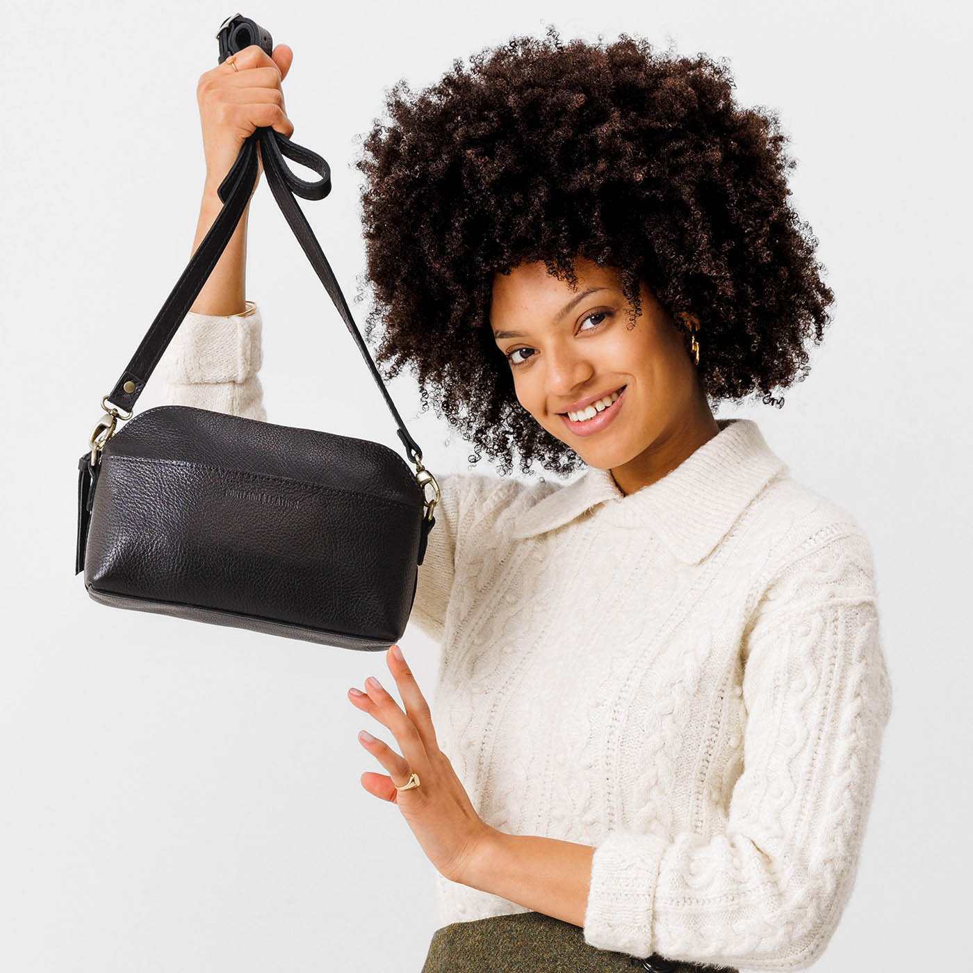 Pebbled--black*Classic | Dome shaped crossbody purse with front and back pockets