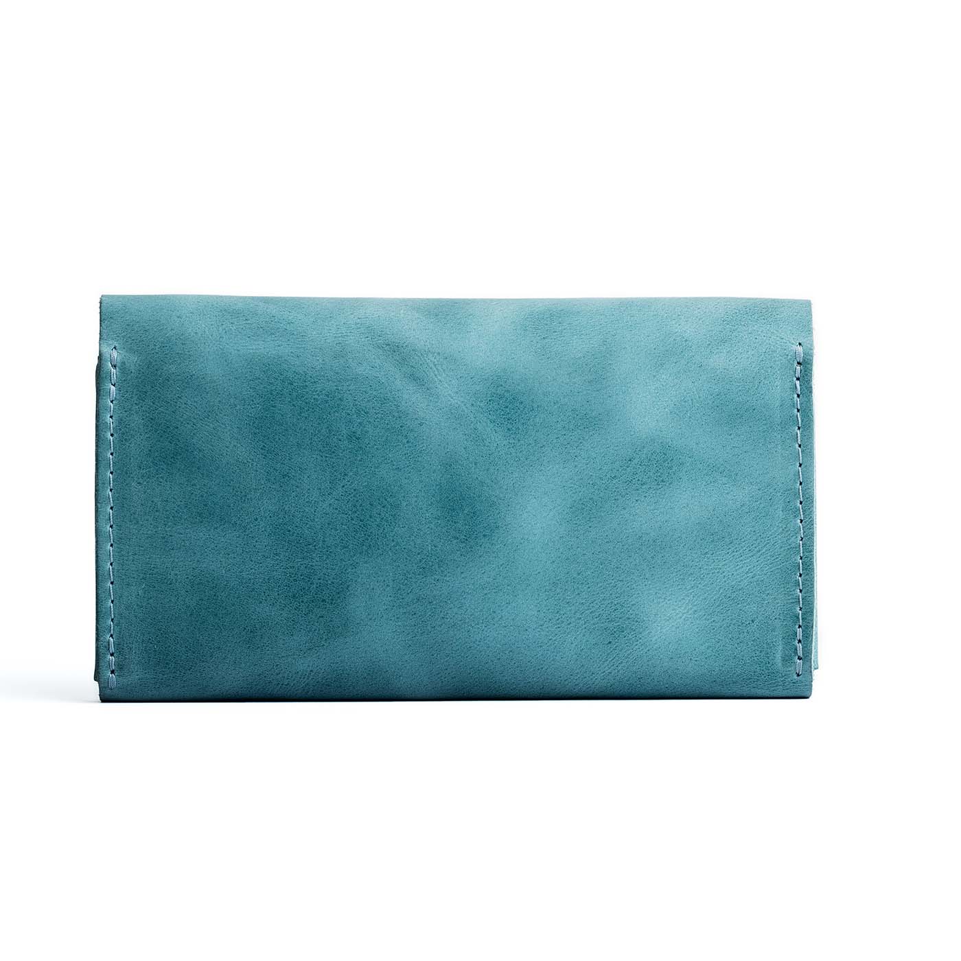 Aqua | Backside of large leather wallet with snap closure