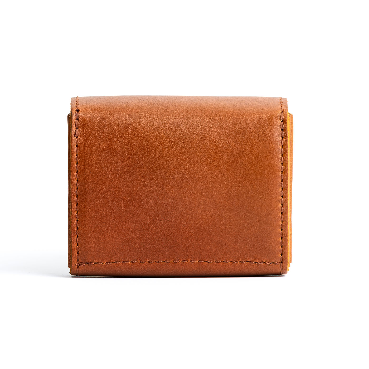 Honey | Backside of compact leather wallet with snap closure 