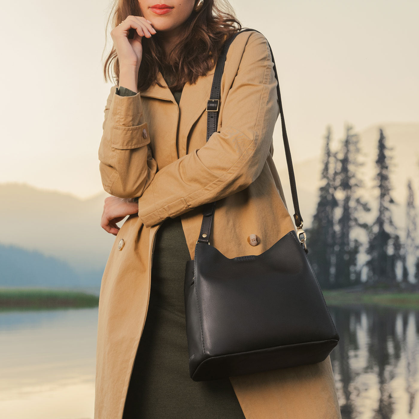  Black | symmetrical bucket bag with latch closure and removable crossbody strap