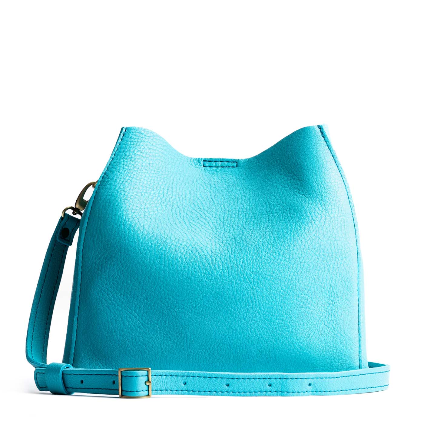 Key West | symmetrical bucket bag with latch closure and removable crossbody strap