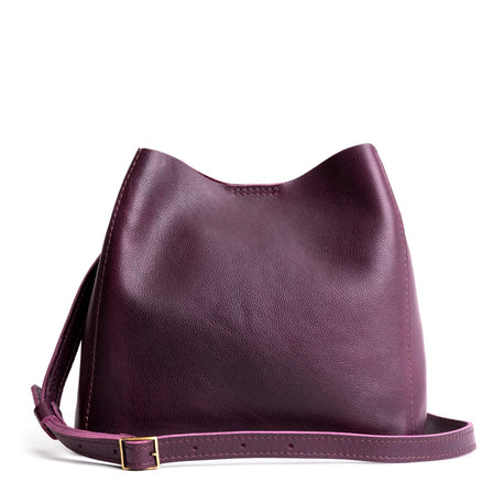 Plum | symmetrical bucket bag with latch closure and removable crossbody strap