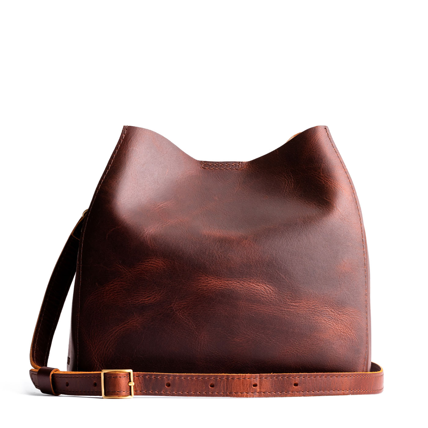 Timber | symmetrical bucket bag with latch closure and removable crossbody strap