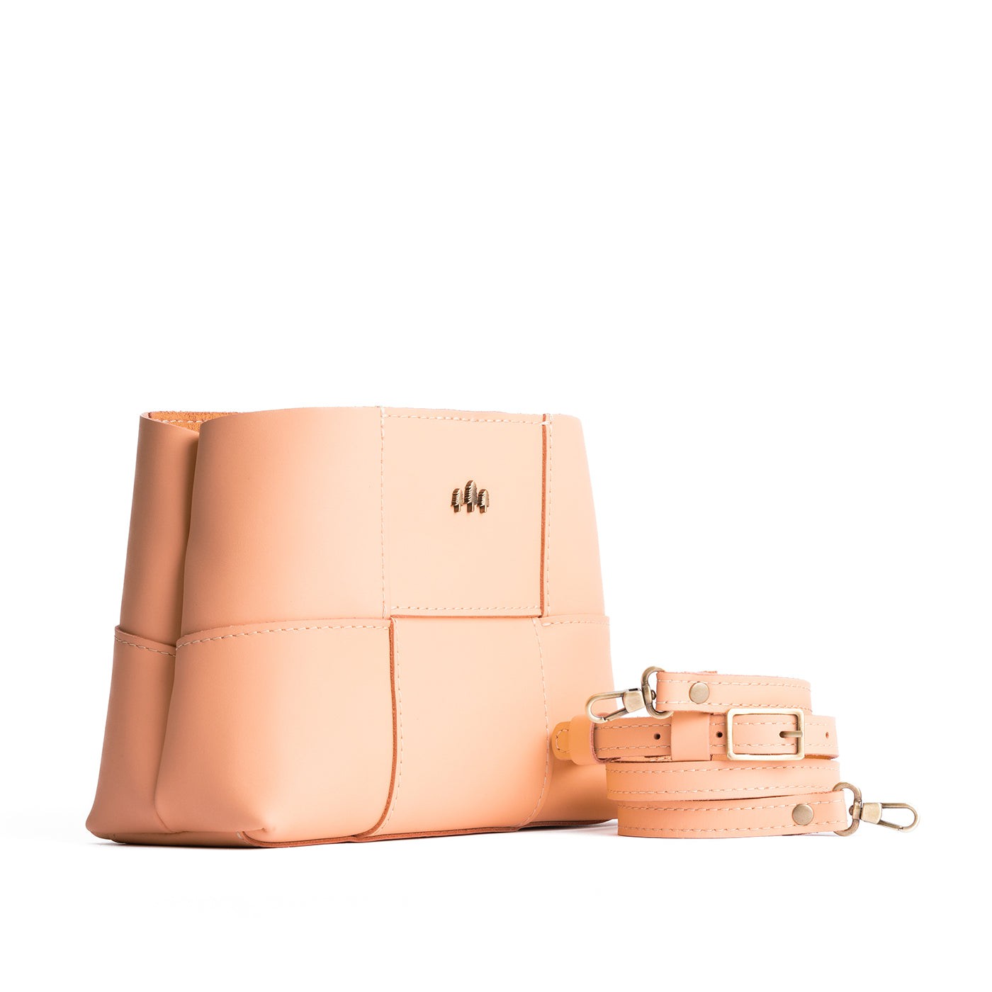 Mamey*Small | Structured woven leather bag with three metal tree emblems and crossbody strap