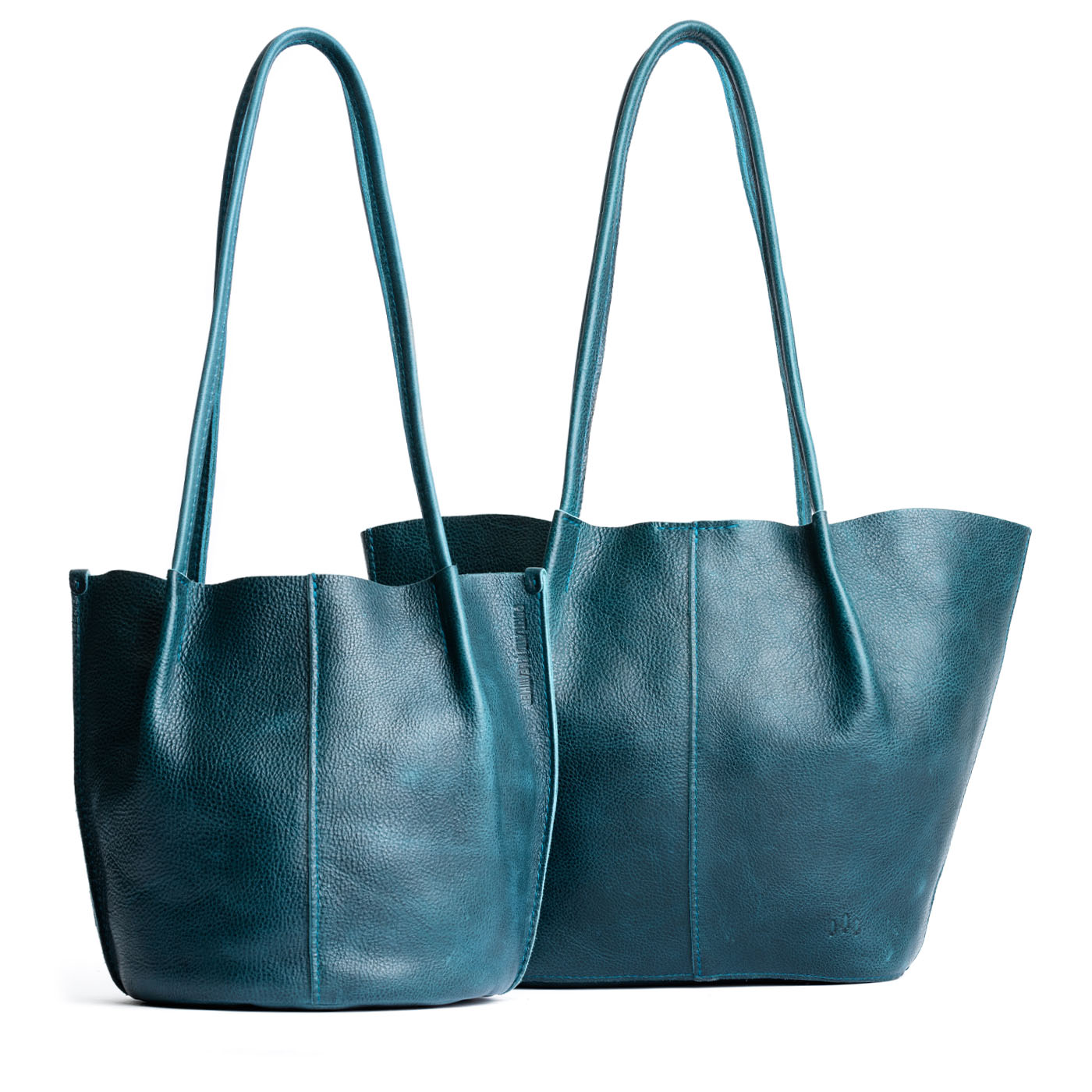 Lagoon | Size comparison of classic and large bucket shaped tote bags with matching leather handles