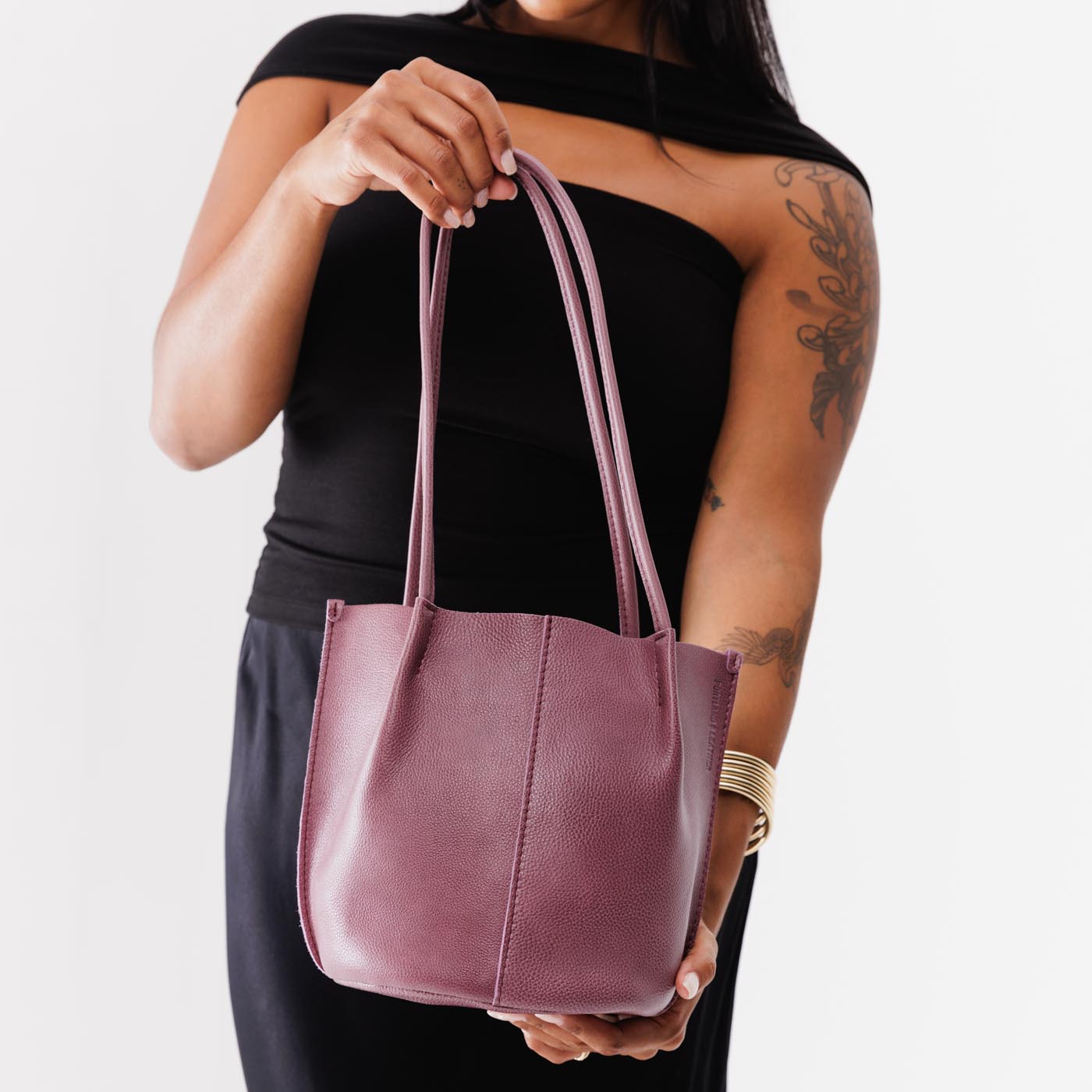 Kyoto*Classic | Model holding petite bucket shaped tote bag with matching leather handles