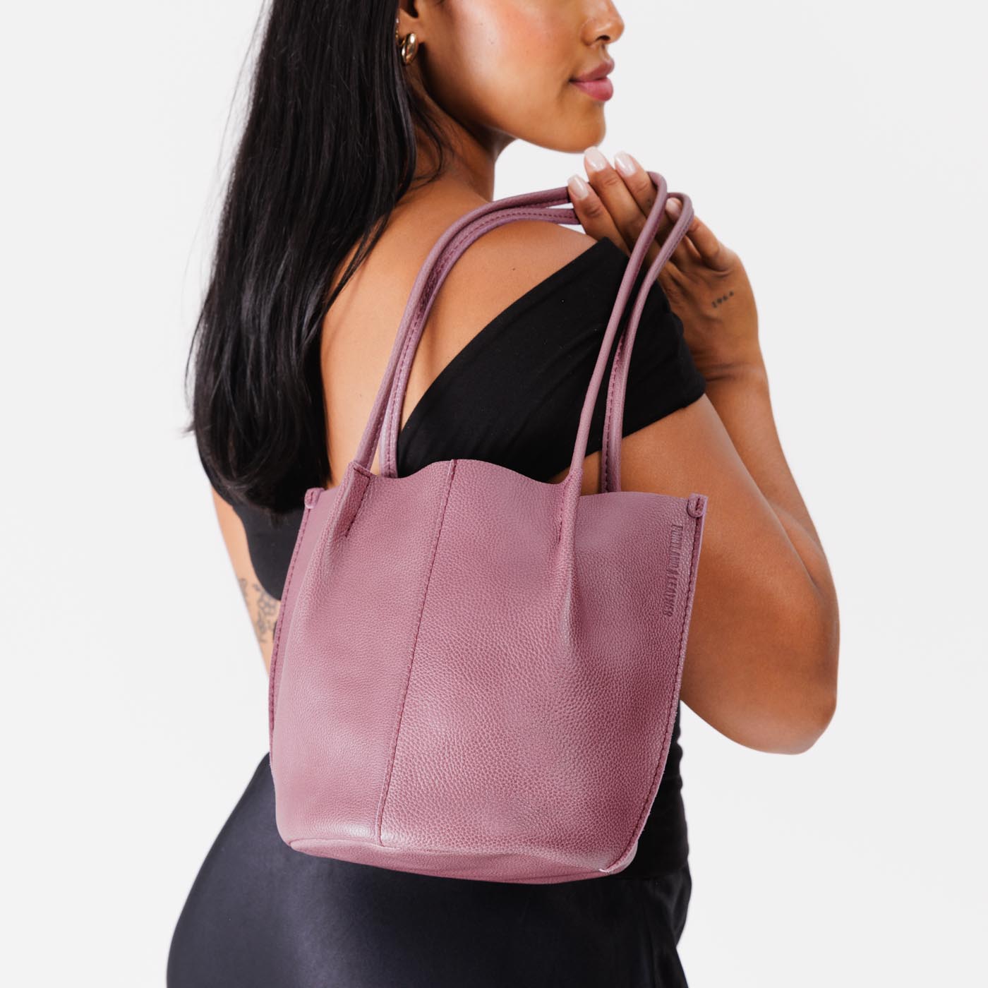 Kyoto*Classic | Model holding petite bucket shaped tote bag with matching leather handles