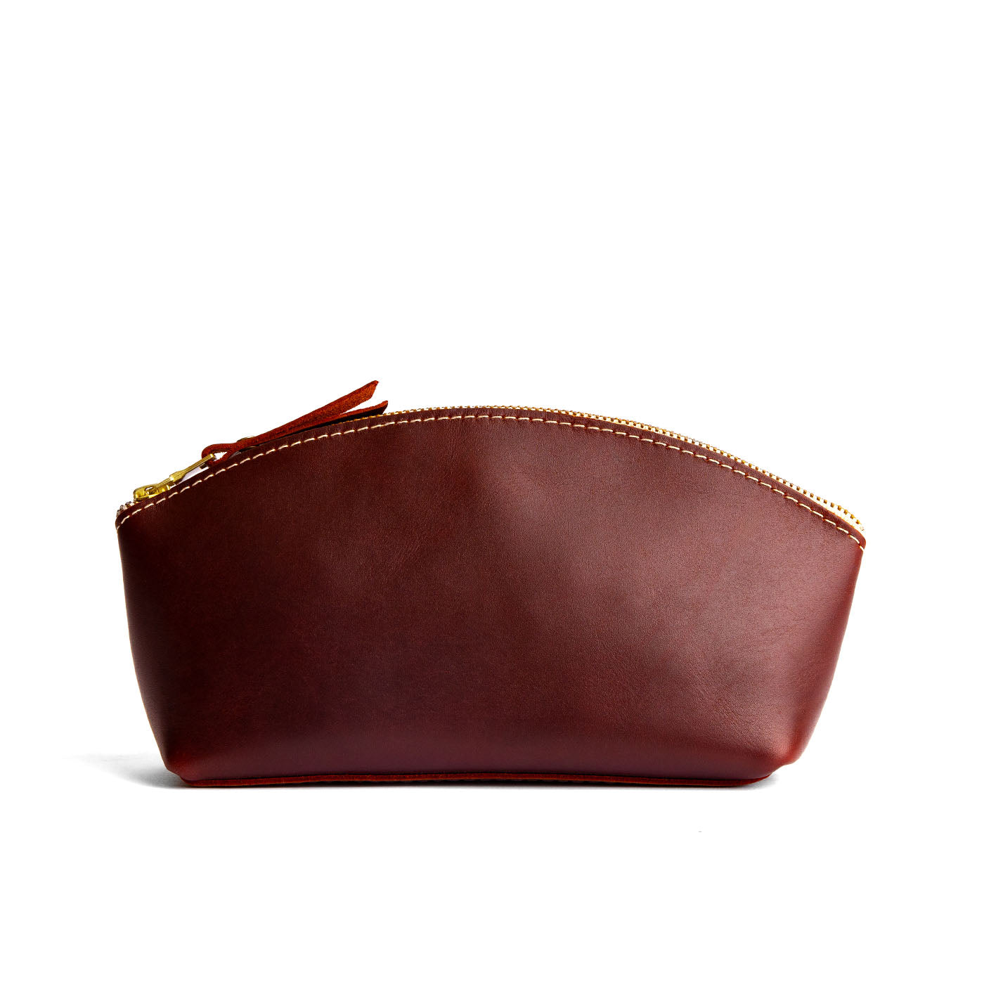 Cognac Eclipse | Spacious leather makeup bag with curved seams and top zipper