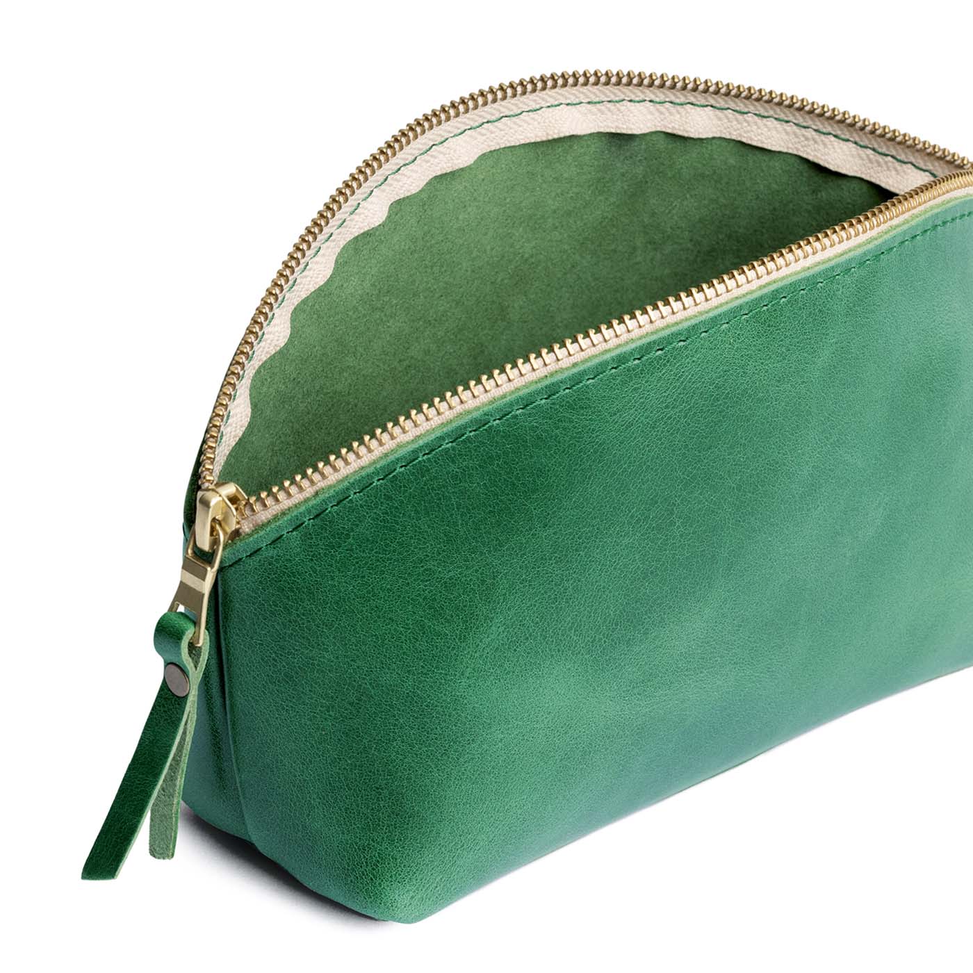 Cowboy Mint | Spacious leather makeup bag with curved seams and top zipper