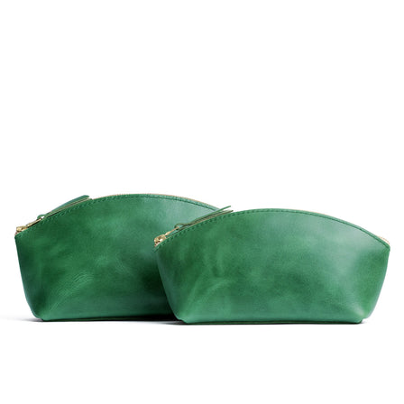 Cowboy Mint | Spacious leather makeup bag with curved seams and top zipper