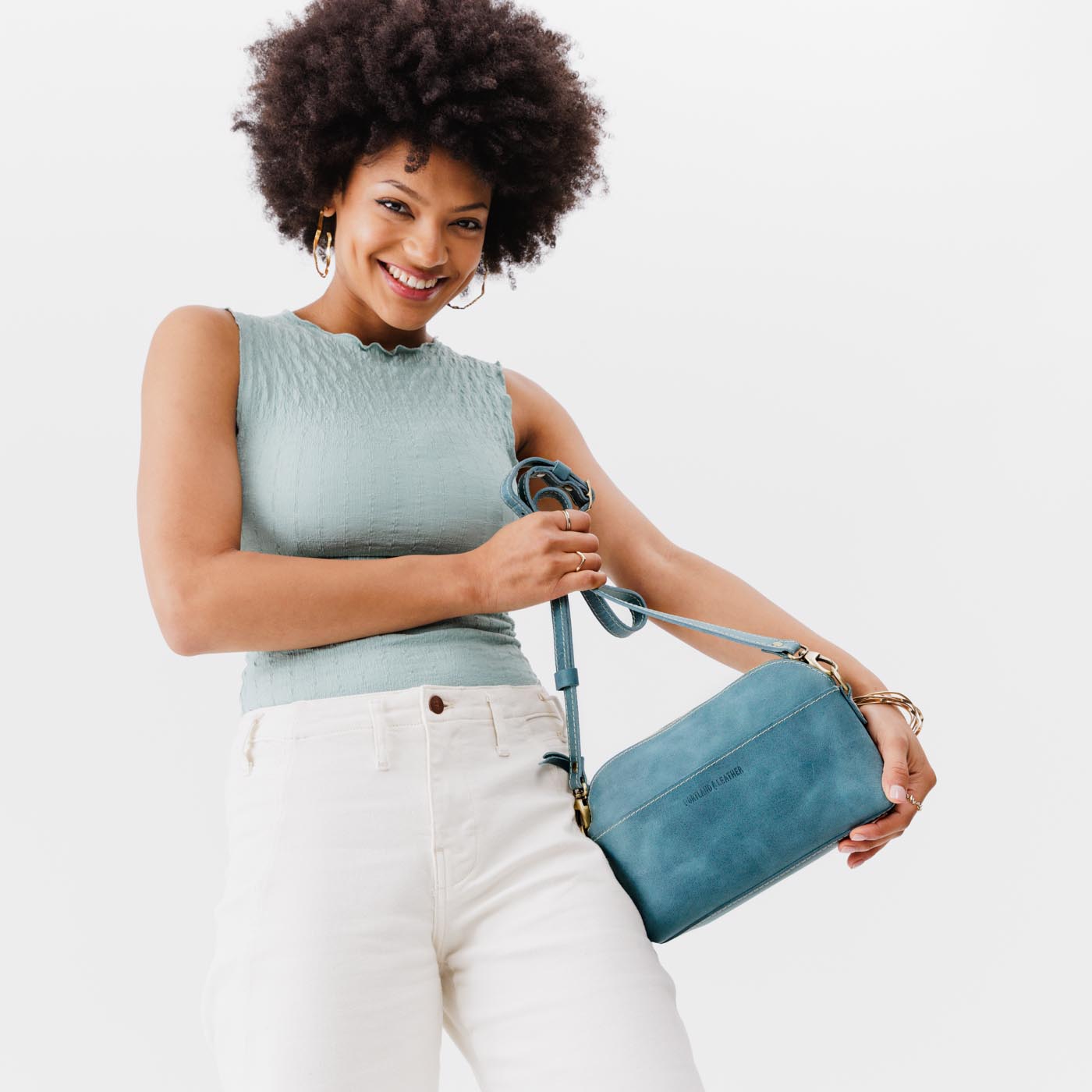 Aqua*Classic | Dome shaped crossbody purse with front and back pockets