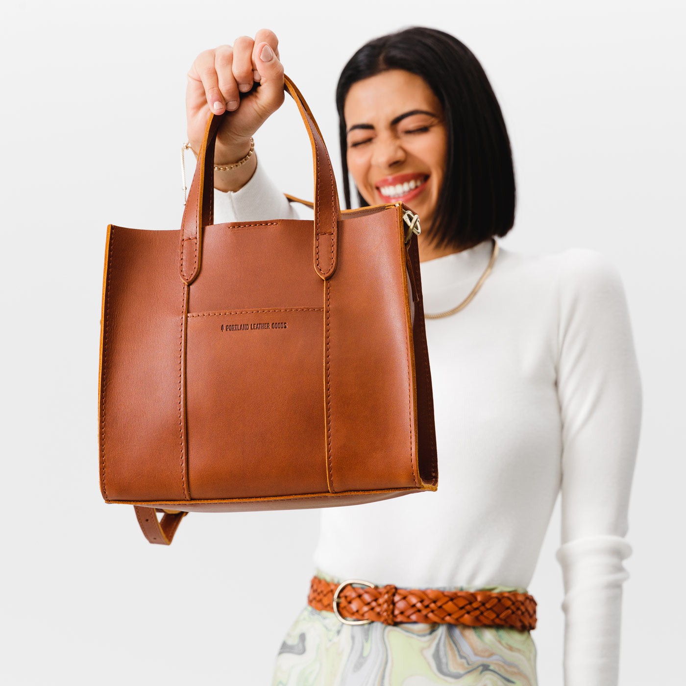 Honey | Structured mid-size tote bag with overlapping panels and crossbody strap