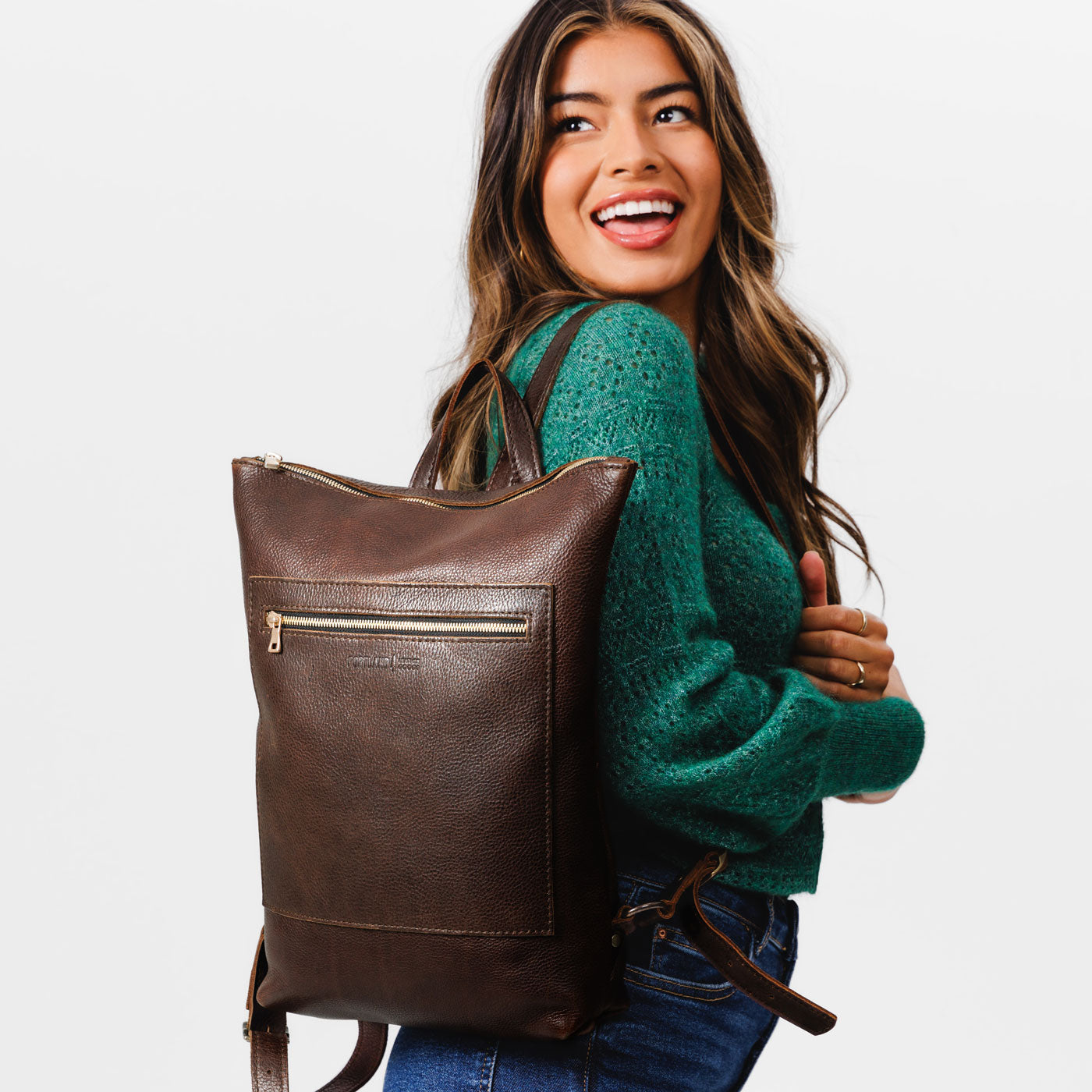 All Color: Coldbrew | Model wearing rectangular slim leather laptop backpack