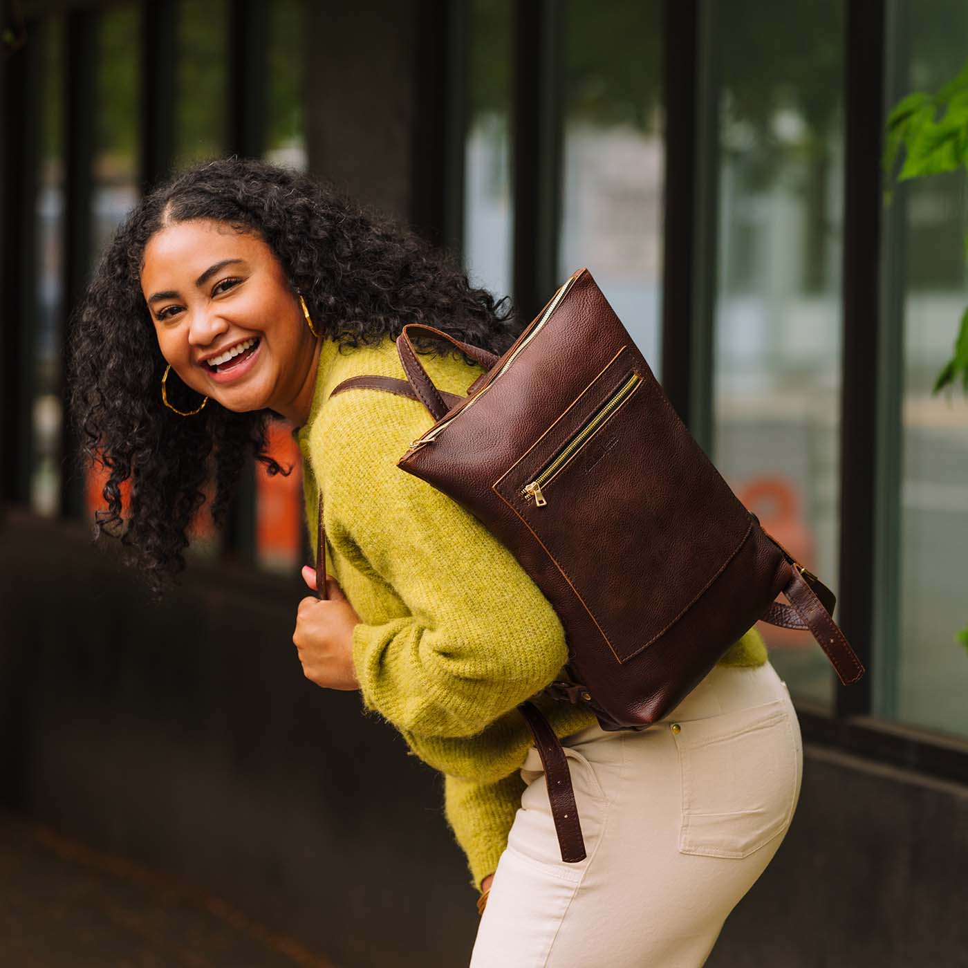 All Color: Coldbrew | Model wearing rectangular slim leather laptop backpack