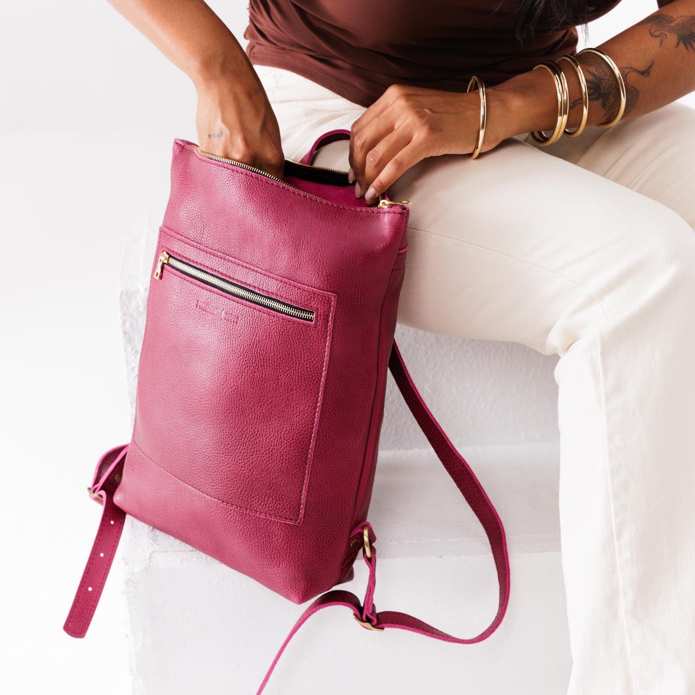 Cosmo | Model wearing rectangular slim leather laptop backpack