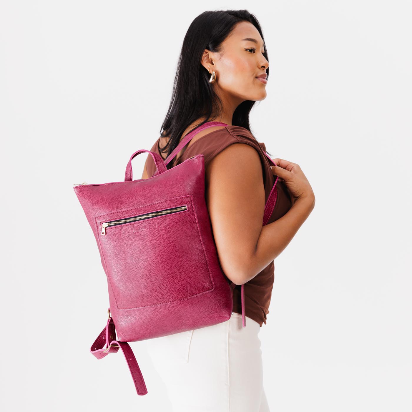 Cosmo | Model wearing rectangular slim leather laptop backpack