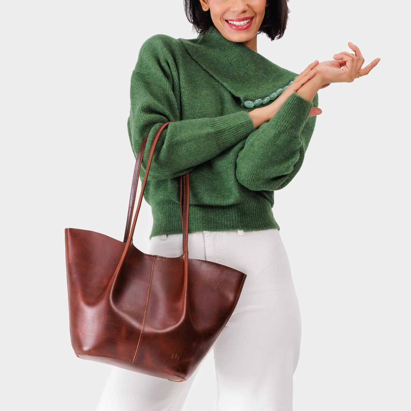 Timber*Large | Model holding wide bucket shaped tote bag with matching leather handles