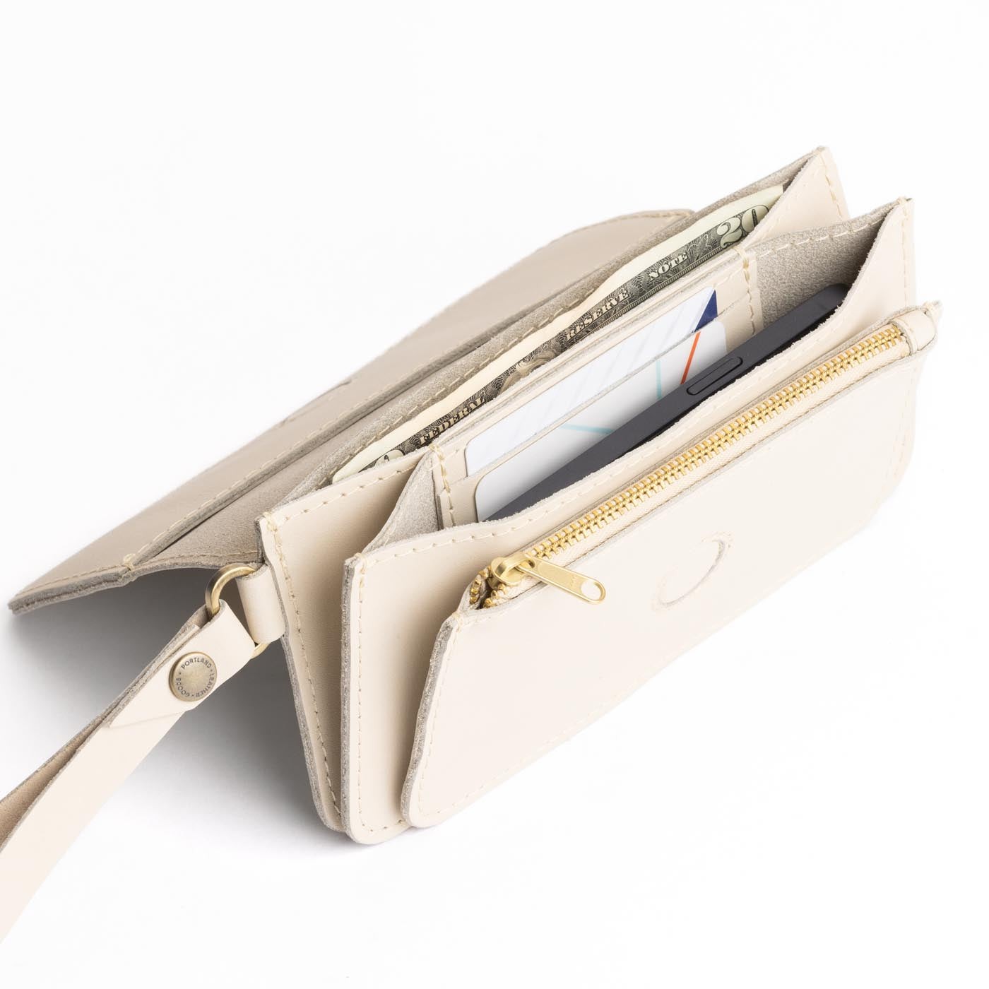 Bone | Leather wallet clutch with wristlet and magnetic closure