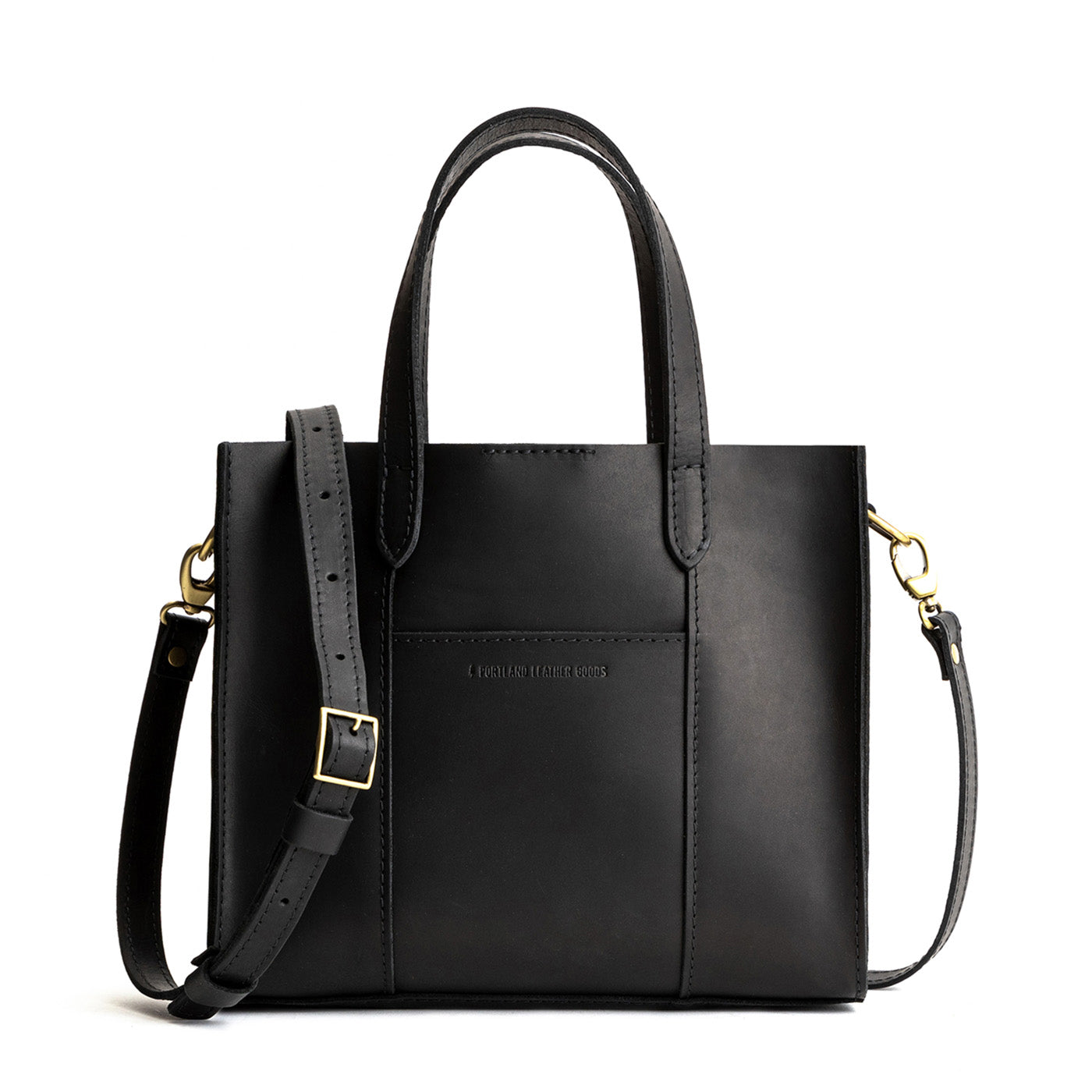 Black Classic | Structured mid-size tote bag with overlapping panels and crossbody strap