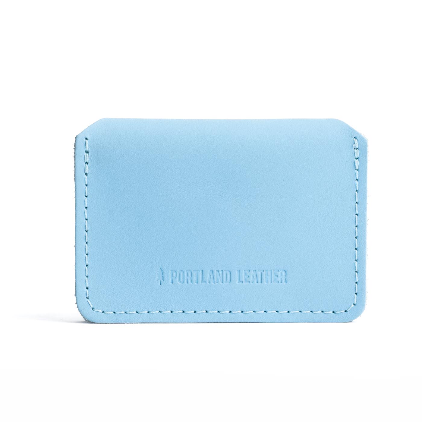 Glacial Blue | Backside of small leather wallet with debossed PLG logo