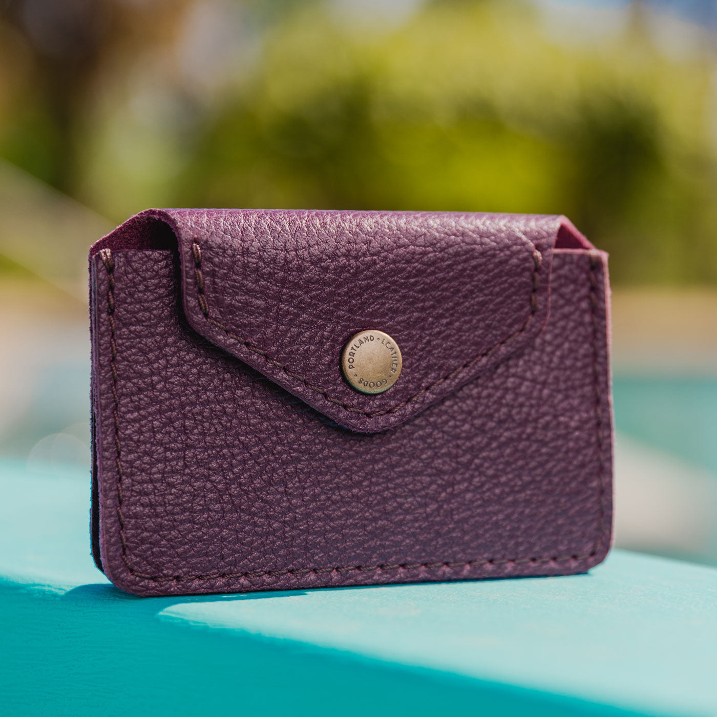 Plum | Small leather wallet with snap closure