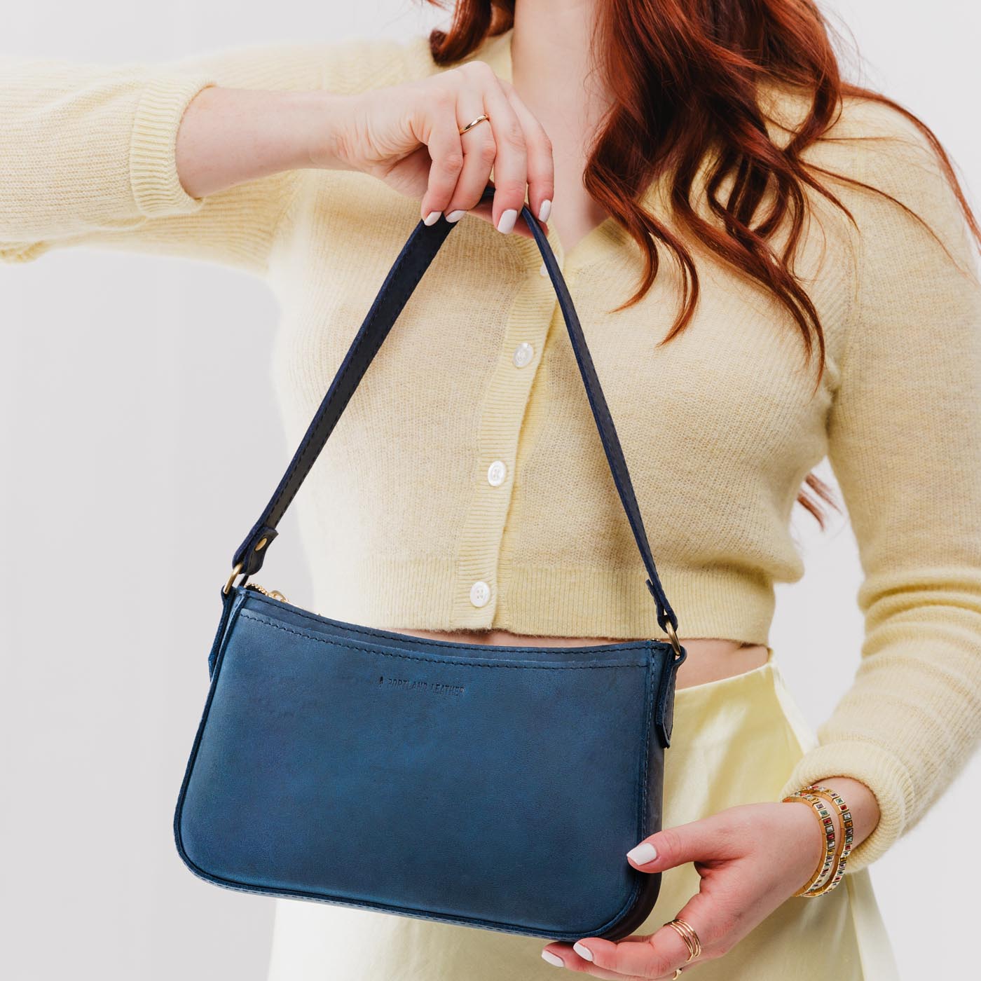  Deep Water | Petite bean shaped shoulder bag with a zipper closure