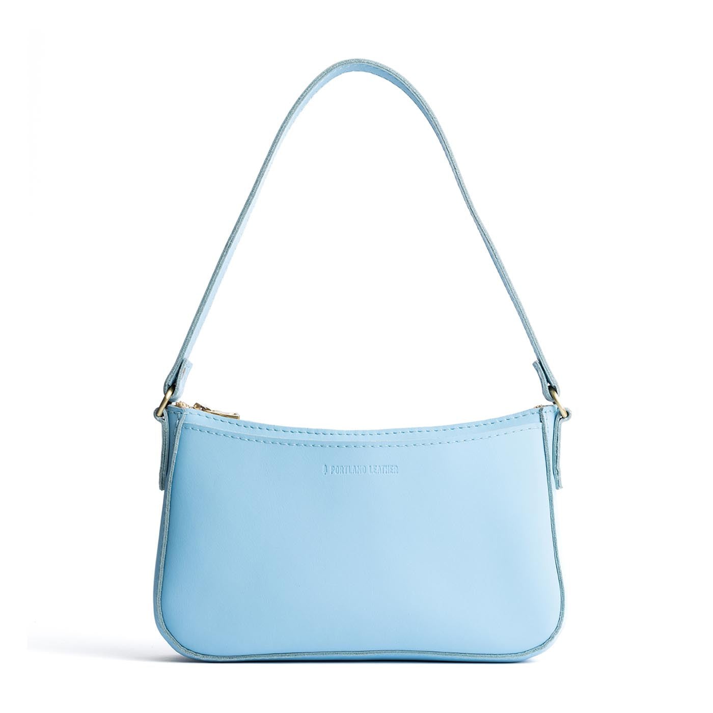 Glacial Blue | Petite bean shaped shoulder bag with a zipper closure