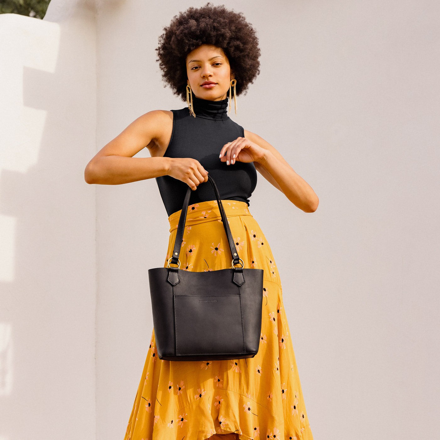  Black | Medium tote bag with antiqued brass toned hardware and front pocket