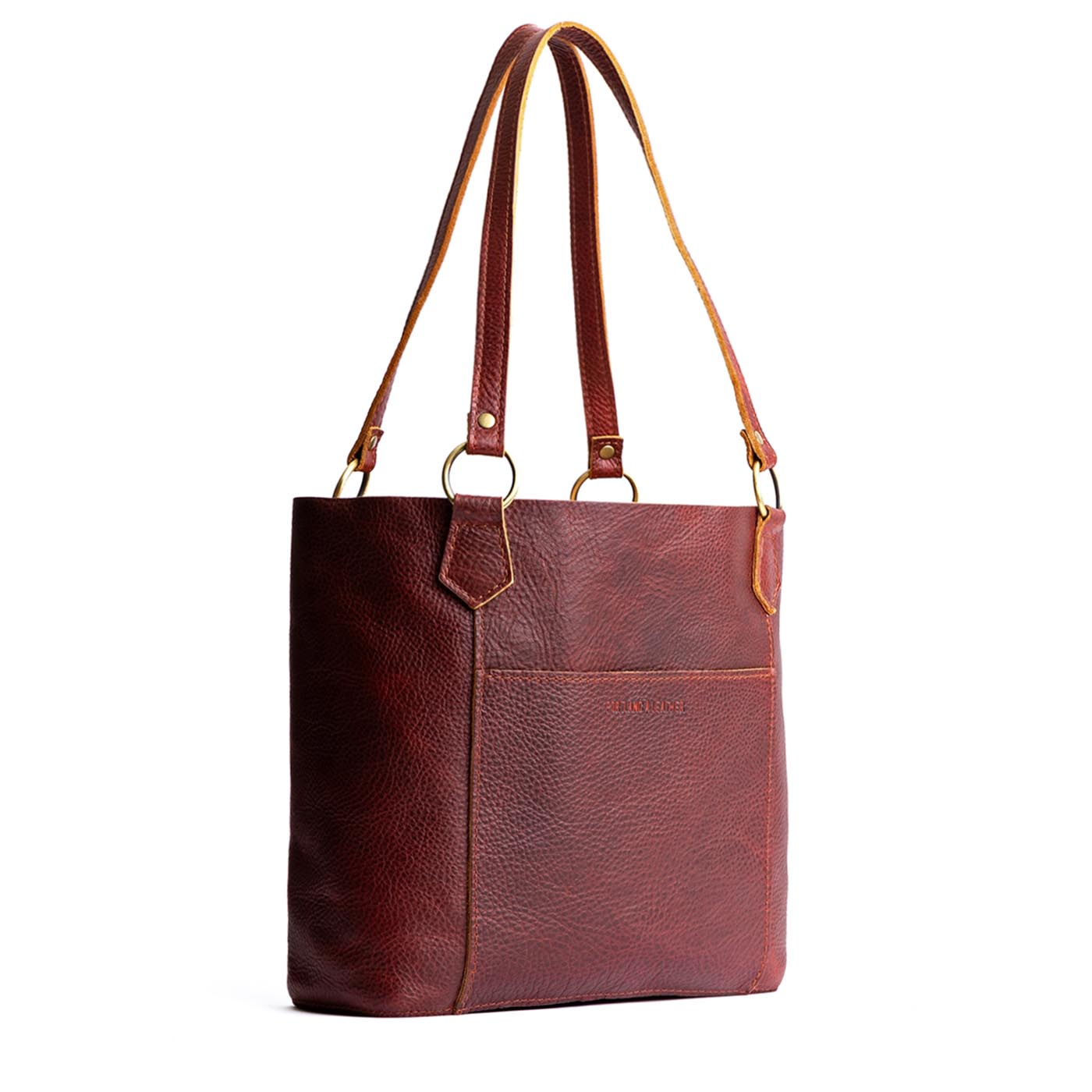 Cinnamon Bear | Medium tote bag with antiqued brass toned hardware and front pocket