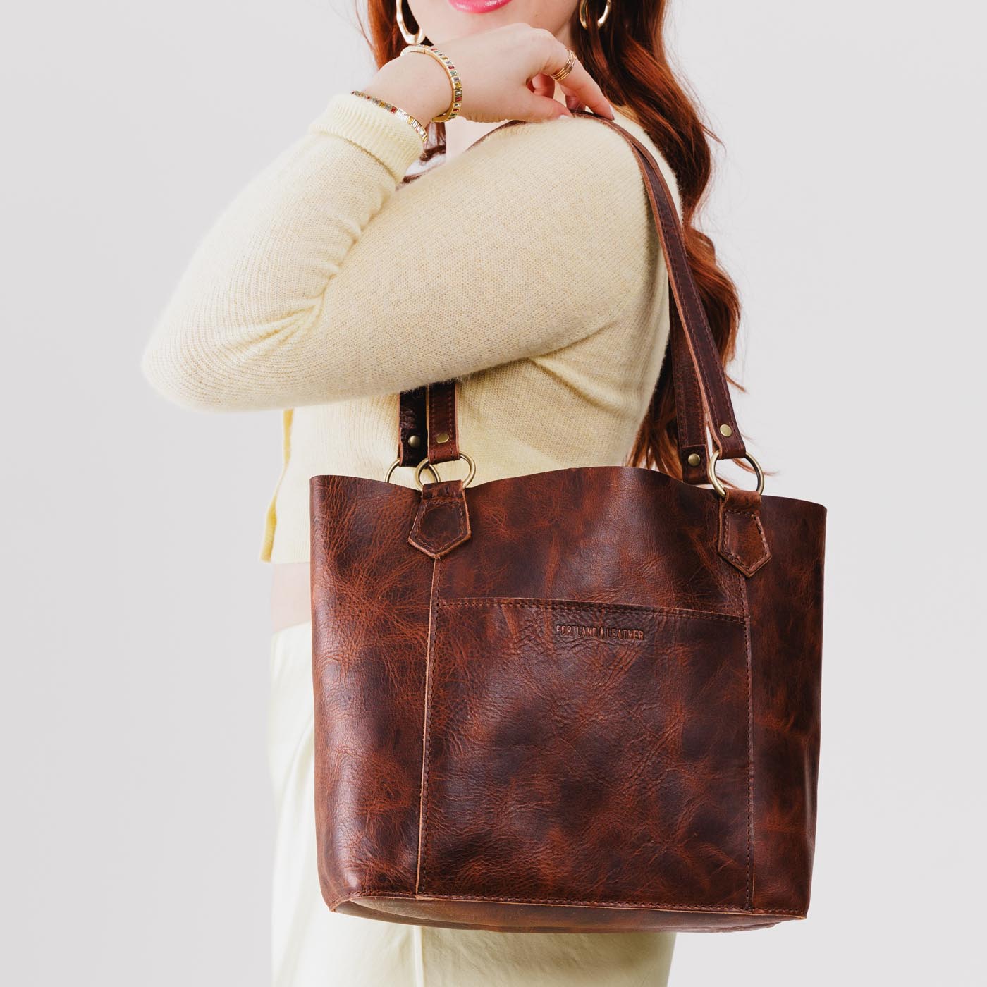  Lava | Medium tote bag with antiqued brass toned hardware and front pocket