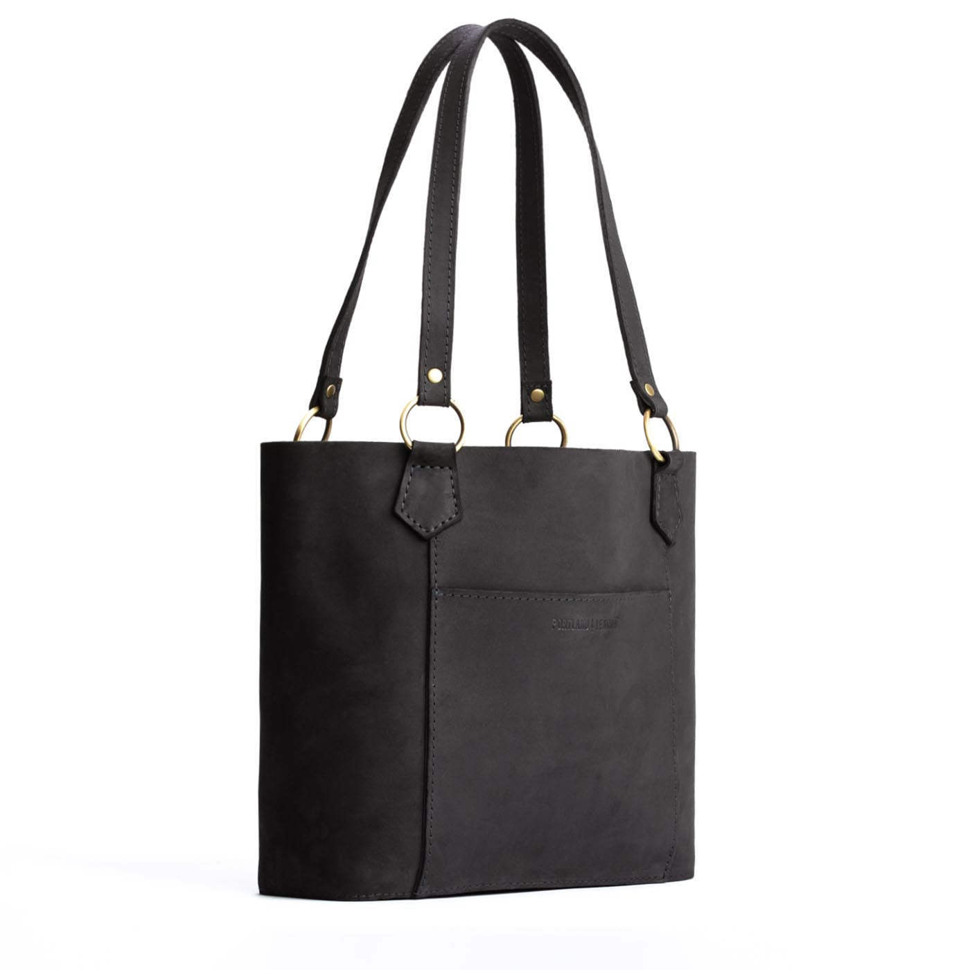 Shadow Black | Medium tote bag with antiqued brass toned hardware and front pocket