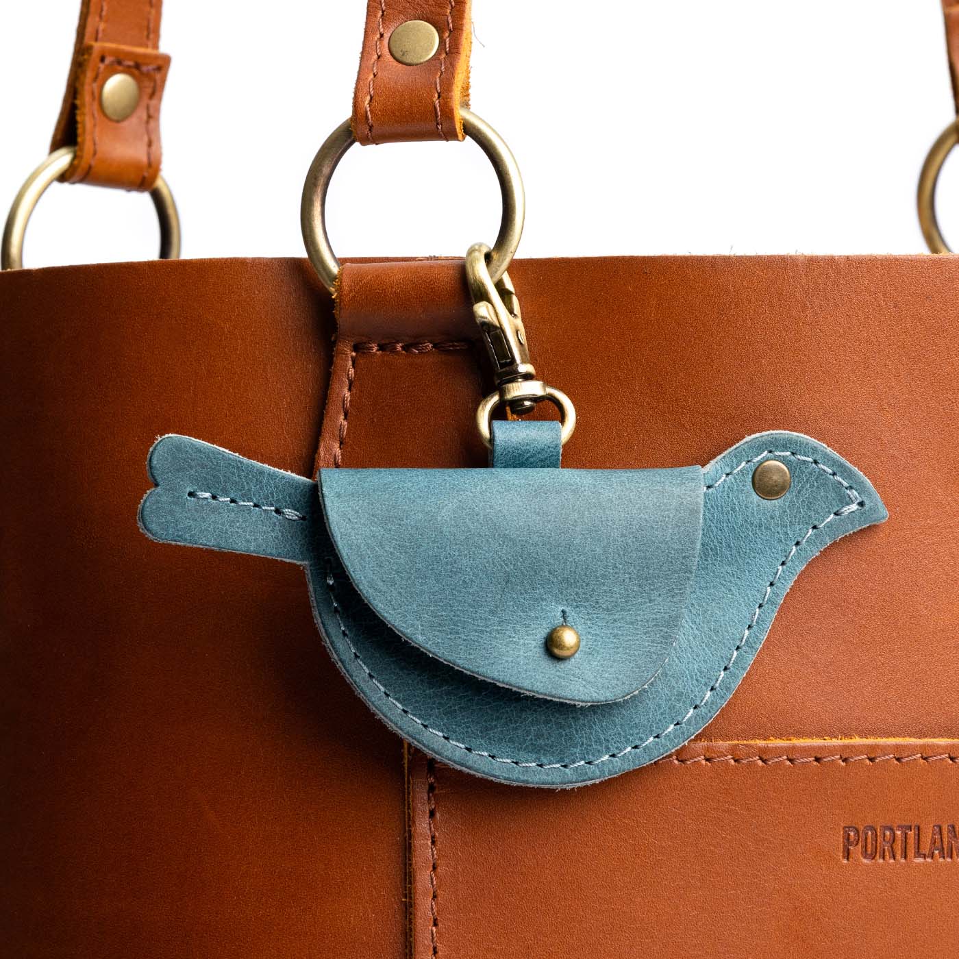 Aqua | Bird shaped pouch with button closure and lobster clasp