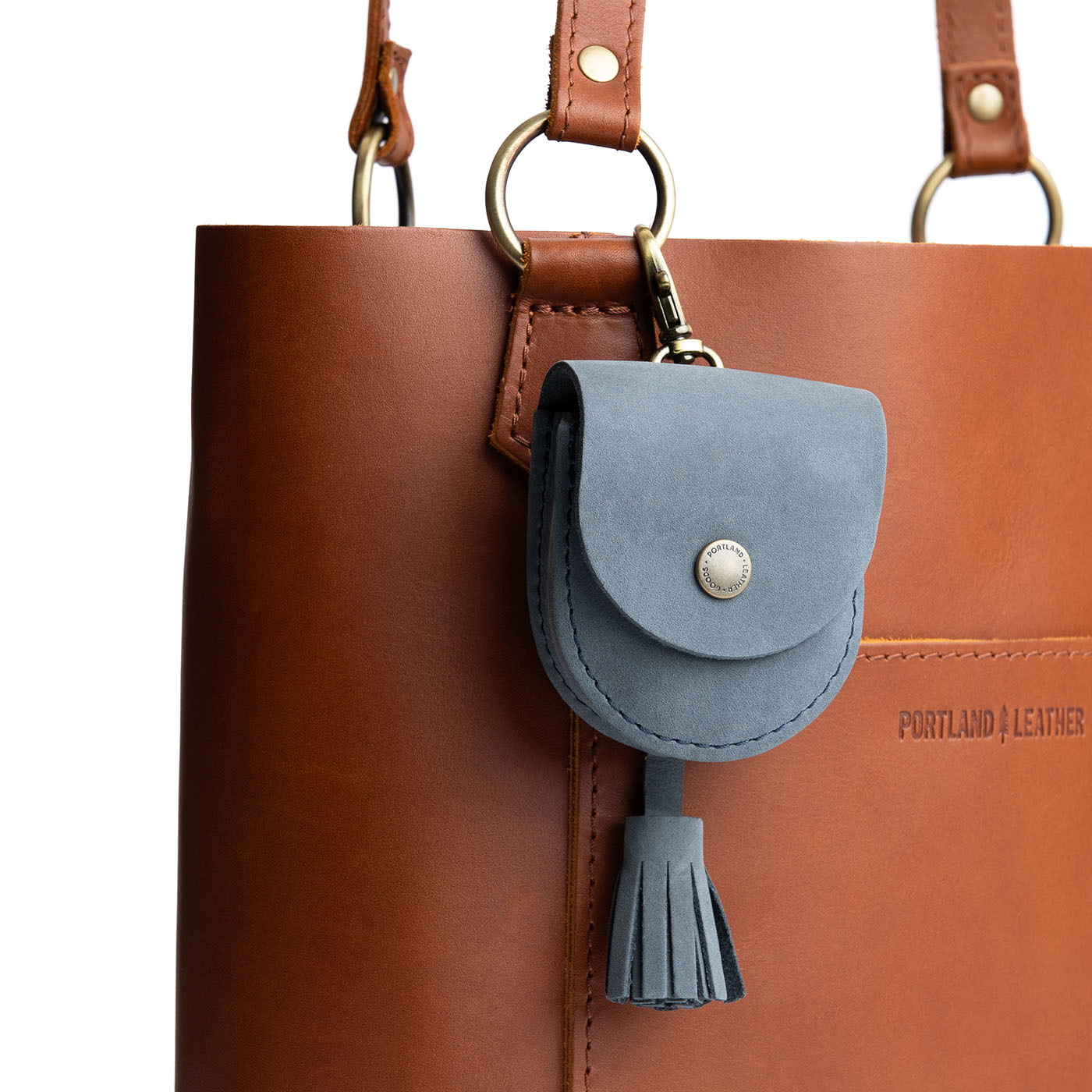 All Color: Storm | U shaped pouch with snap closure, lobster clasp and fringed tassel