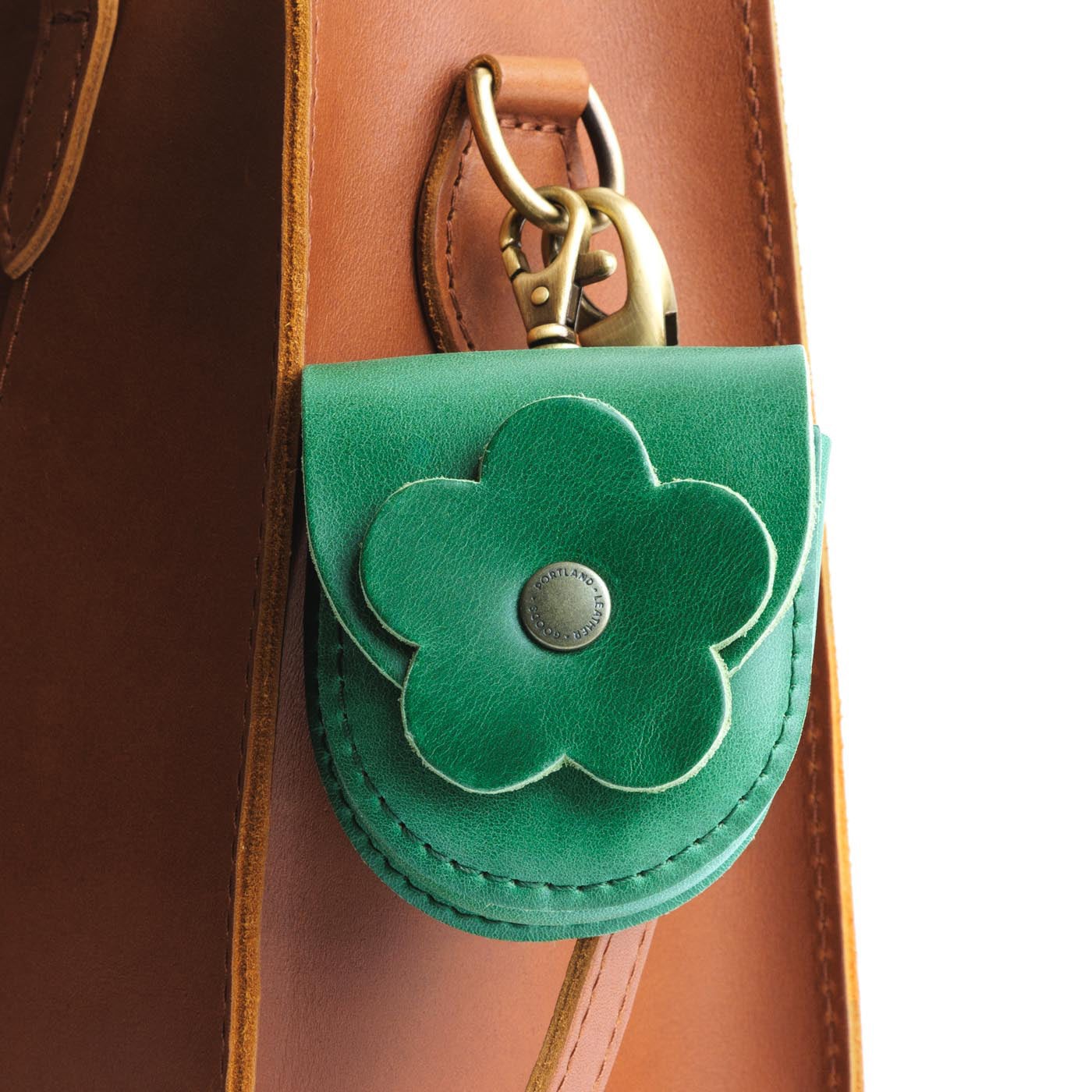 All Color: Cowboy Mint | U shaped pouch with leather flower applique