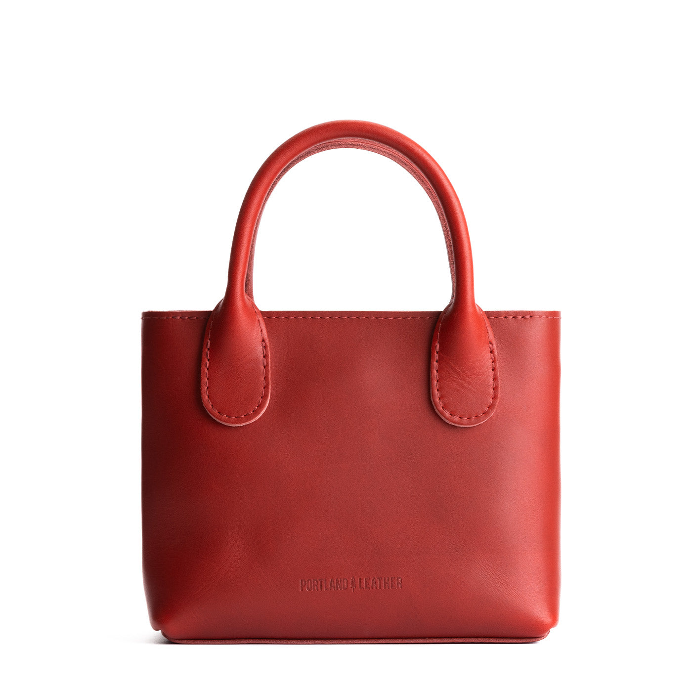 Folklore Ruby*Small | Petite tote purse with embroidered flower design, structured leather handles, and crossbody strap