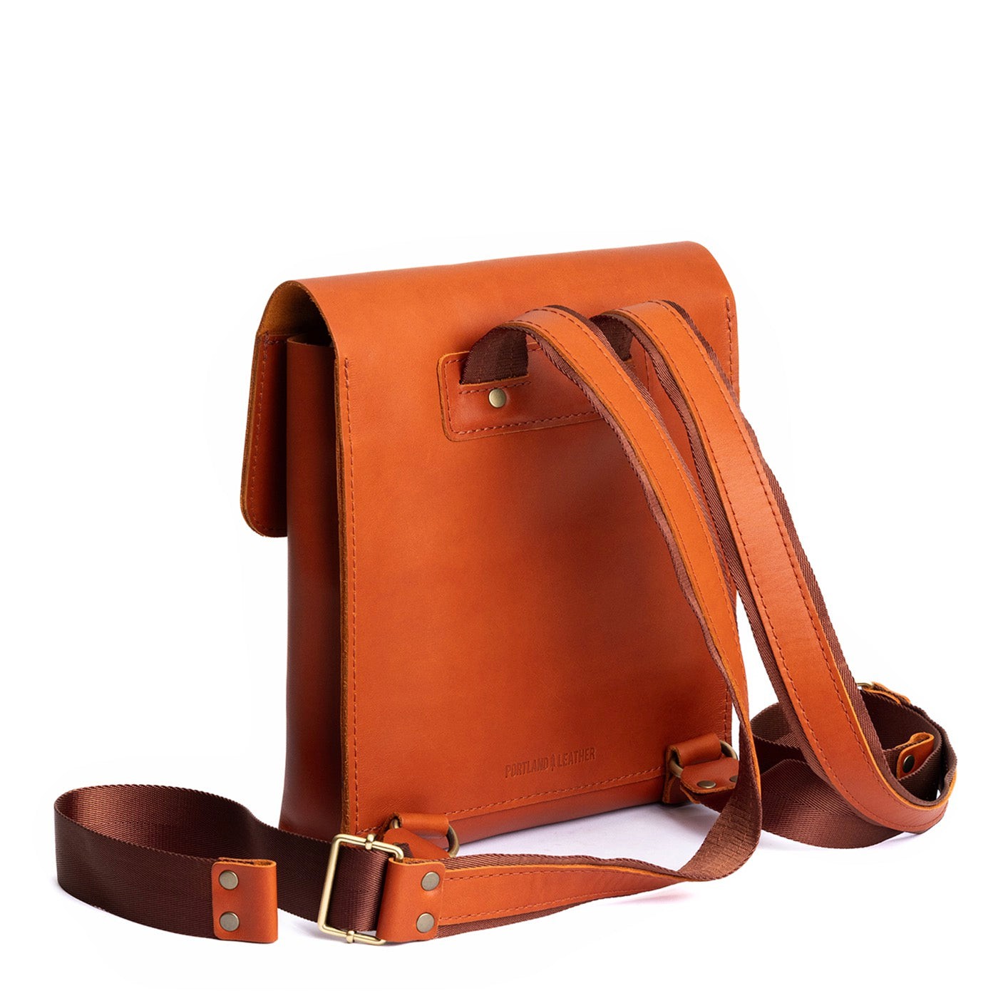 Tuscany | Rectangular backpack with leather lined nylon straps and magnetic flap closure