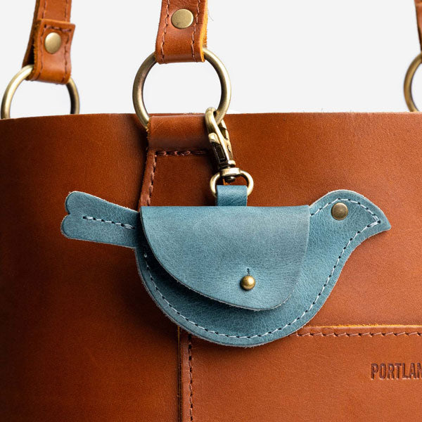 Aqua | Bird shaped pouch with button closure and lobster clasp