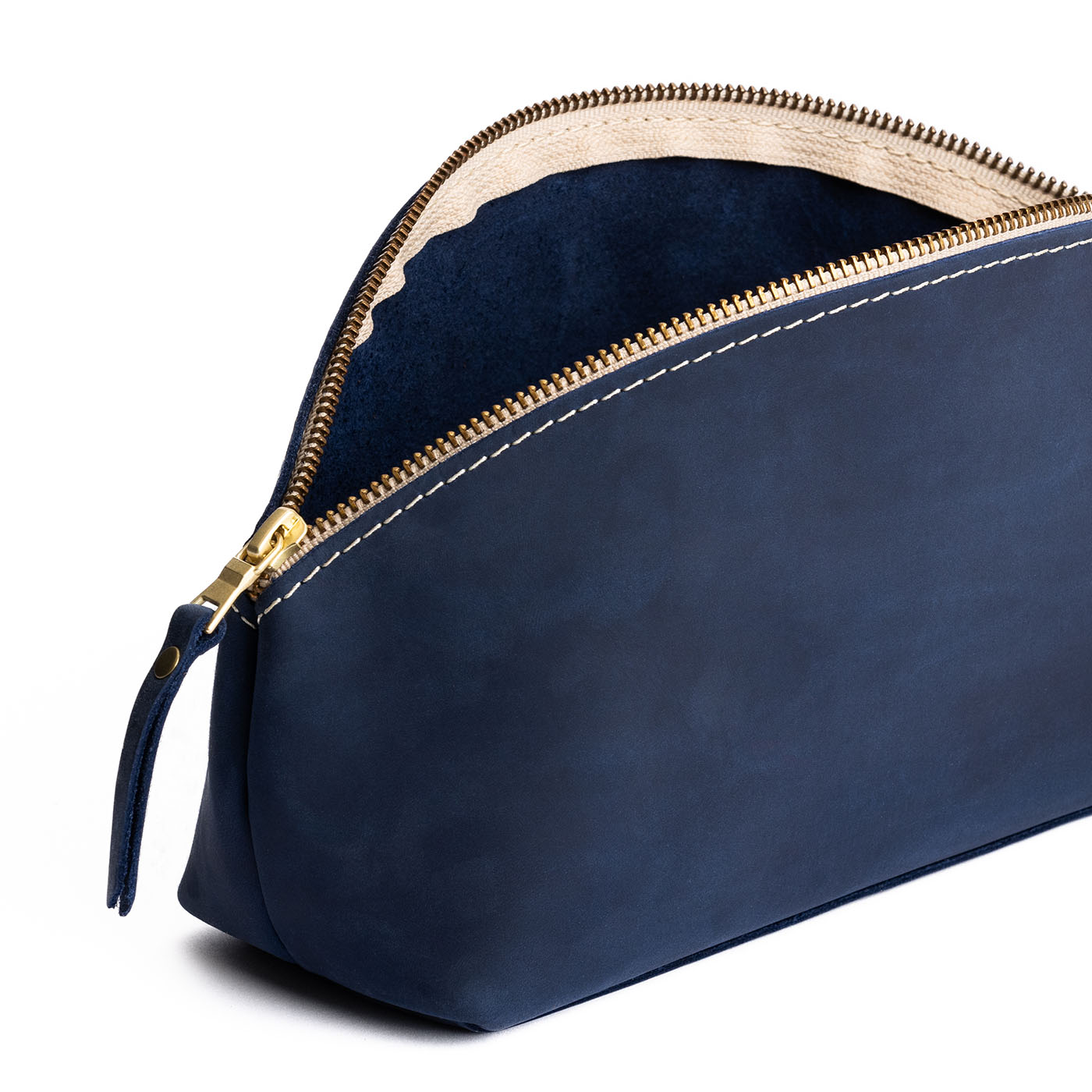 Deep Water | Spacious leather makeup bag with curved seams and top zipper