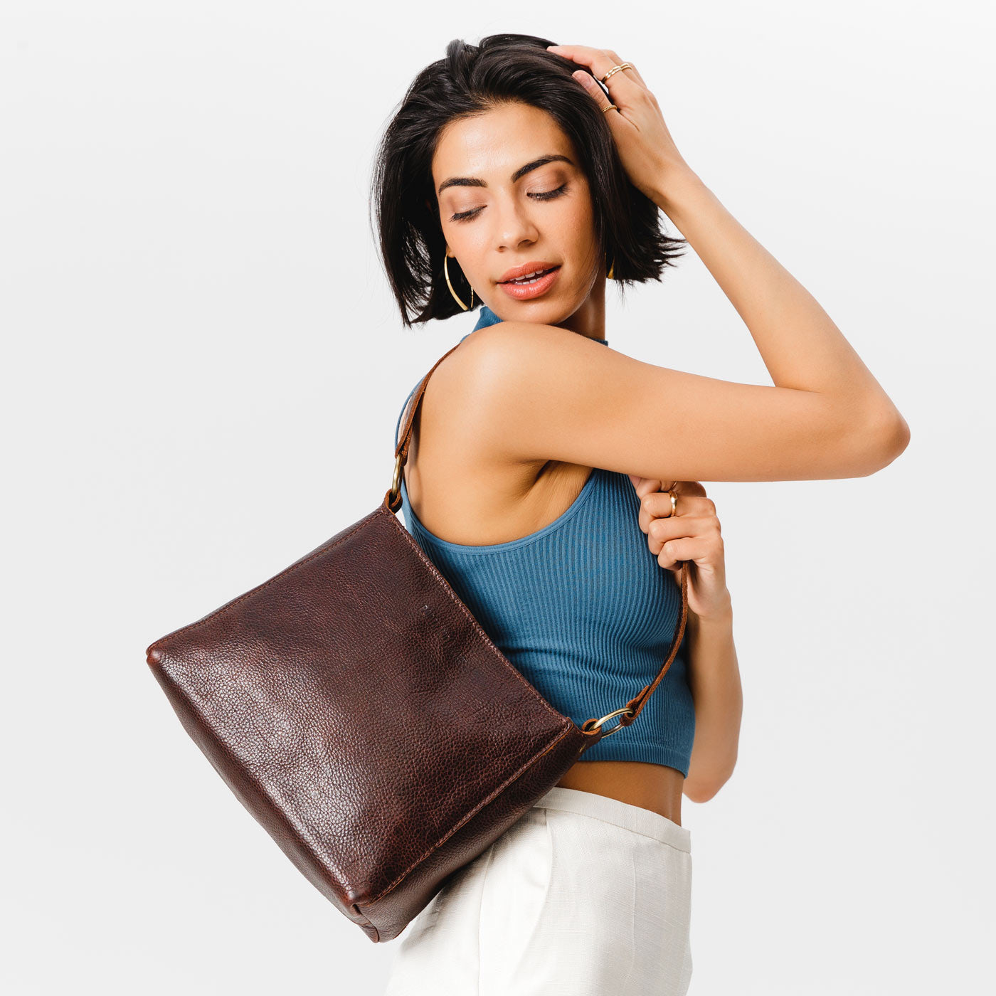  Coldbrew | Triangular shoulder bag with antiqued brass finished hardware