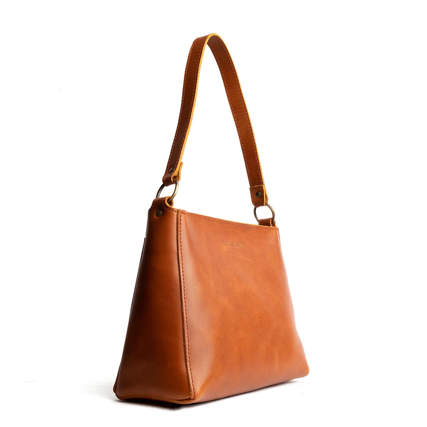 Honey | Triangular shoulder bag with antiqued brass finished hardware